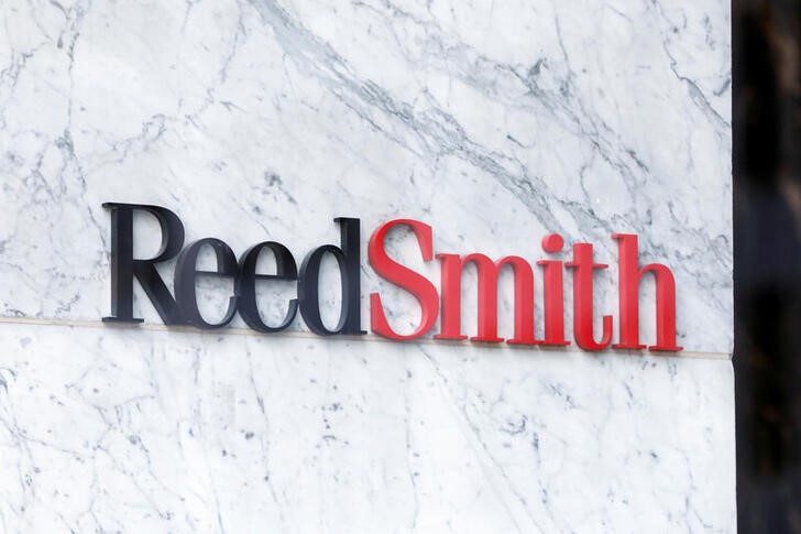 Signage is seen in the lobby of the law firm Reed Smith LLP in Manhattan, New York City