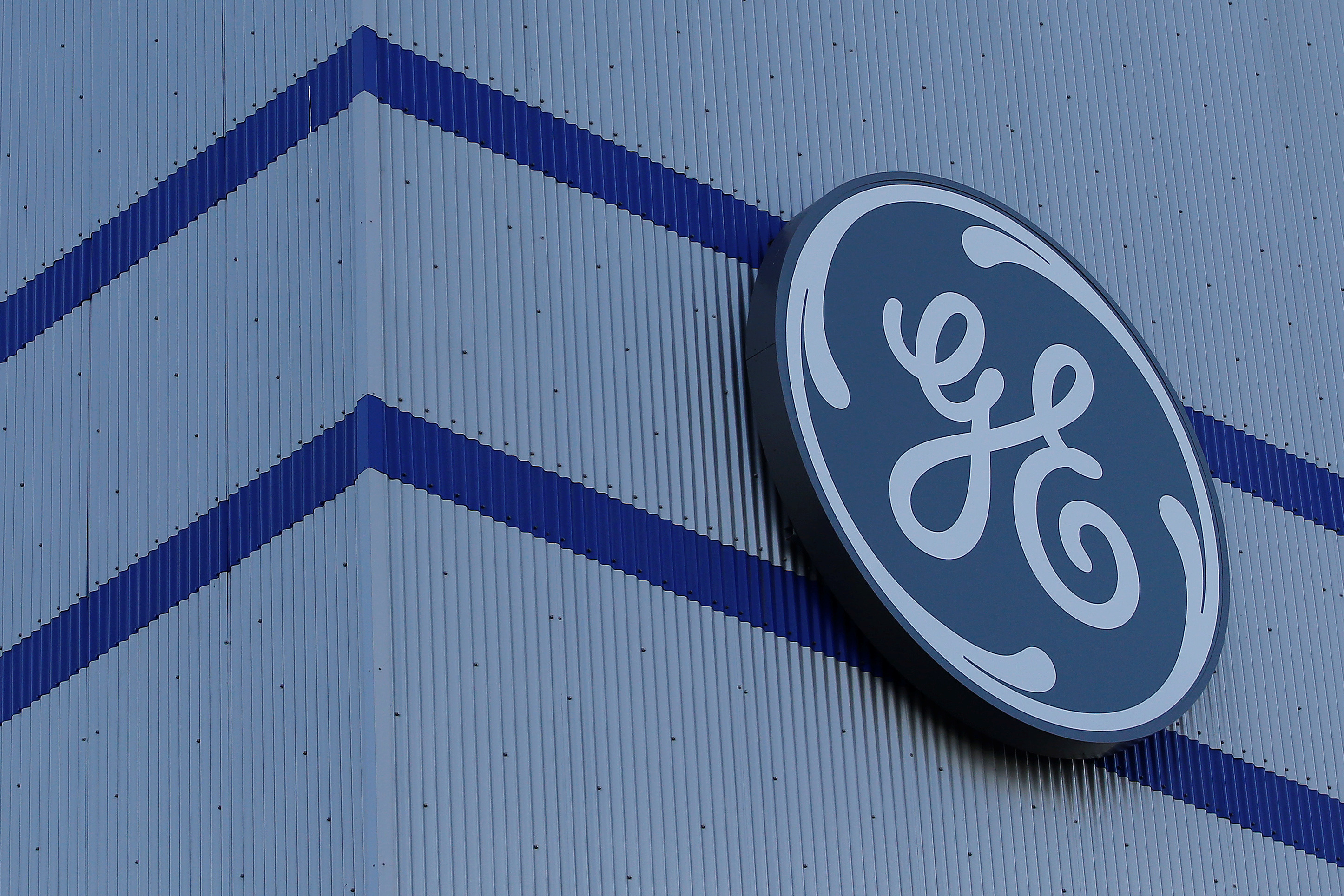 The General Electric logo is pictured on the General Electric offshore wind turbine plant in Montoir-de-Bretagne