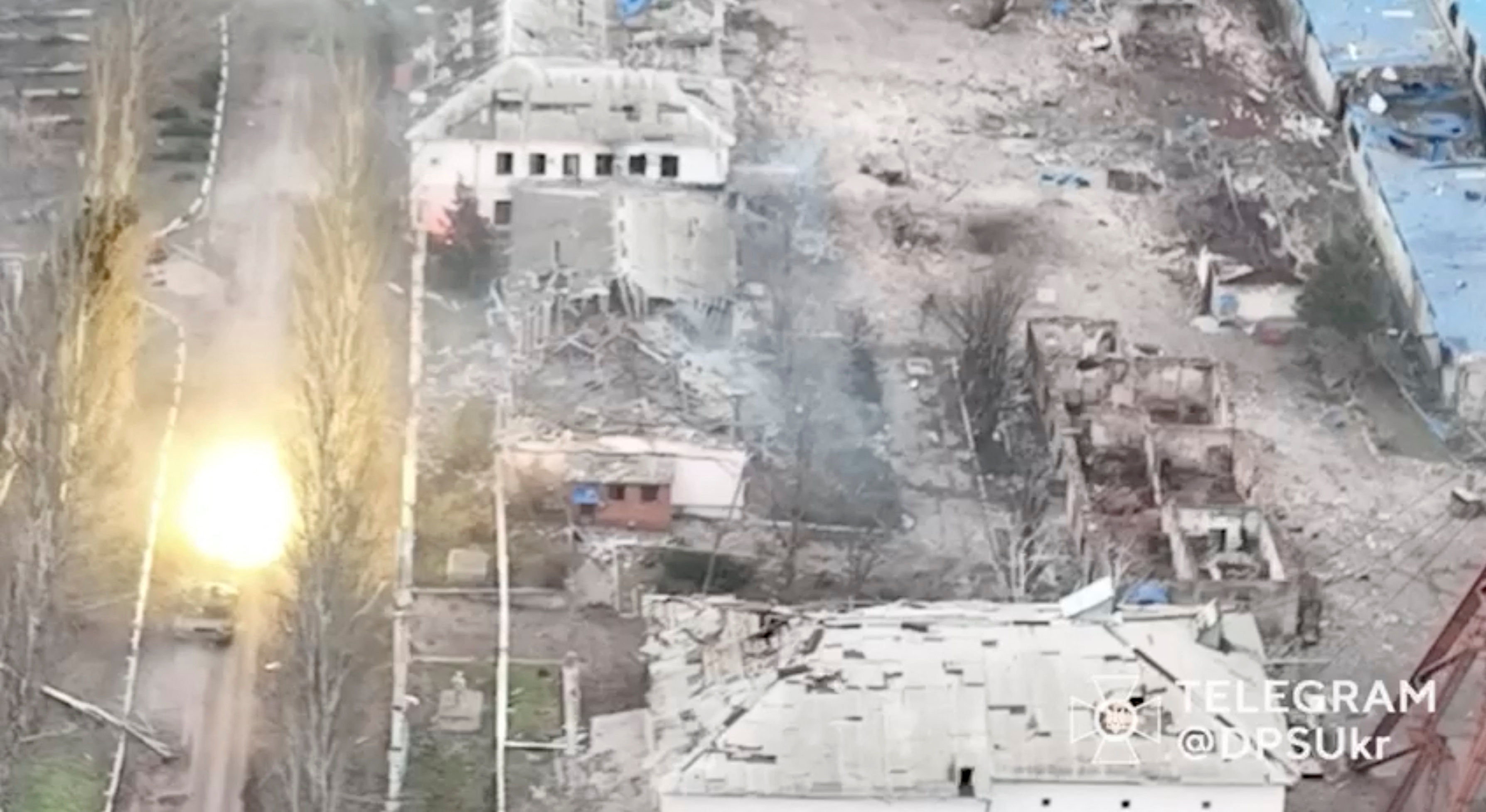 A tank fires a round, amid Russia's attack on Ukraine, in Soledar