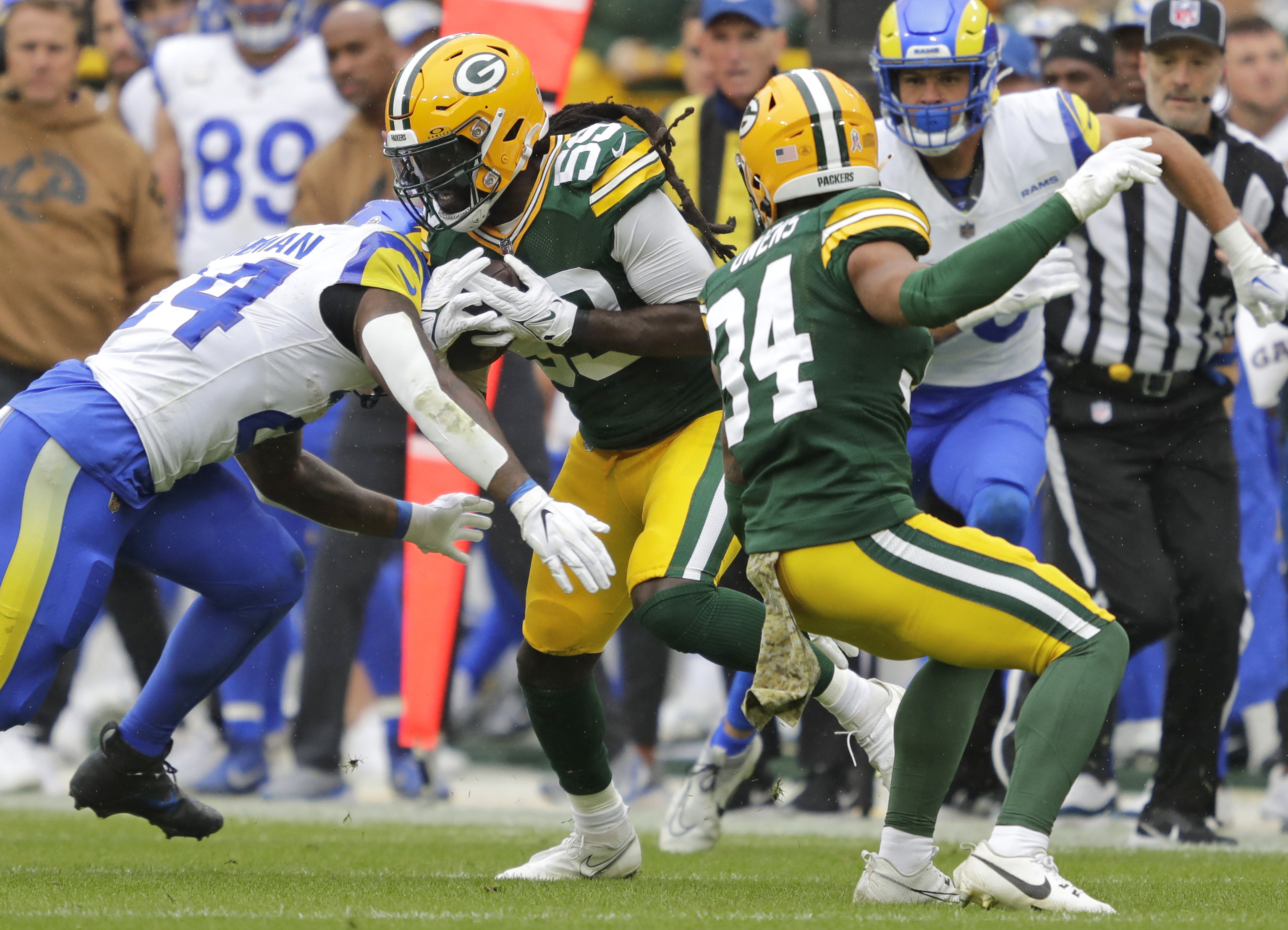 Packers shut down Rams 20-3, end losing skid | Reuters