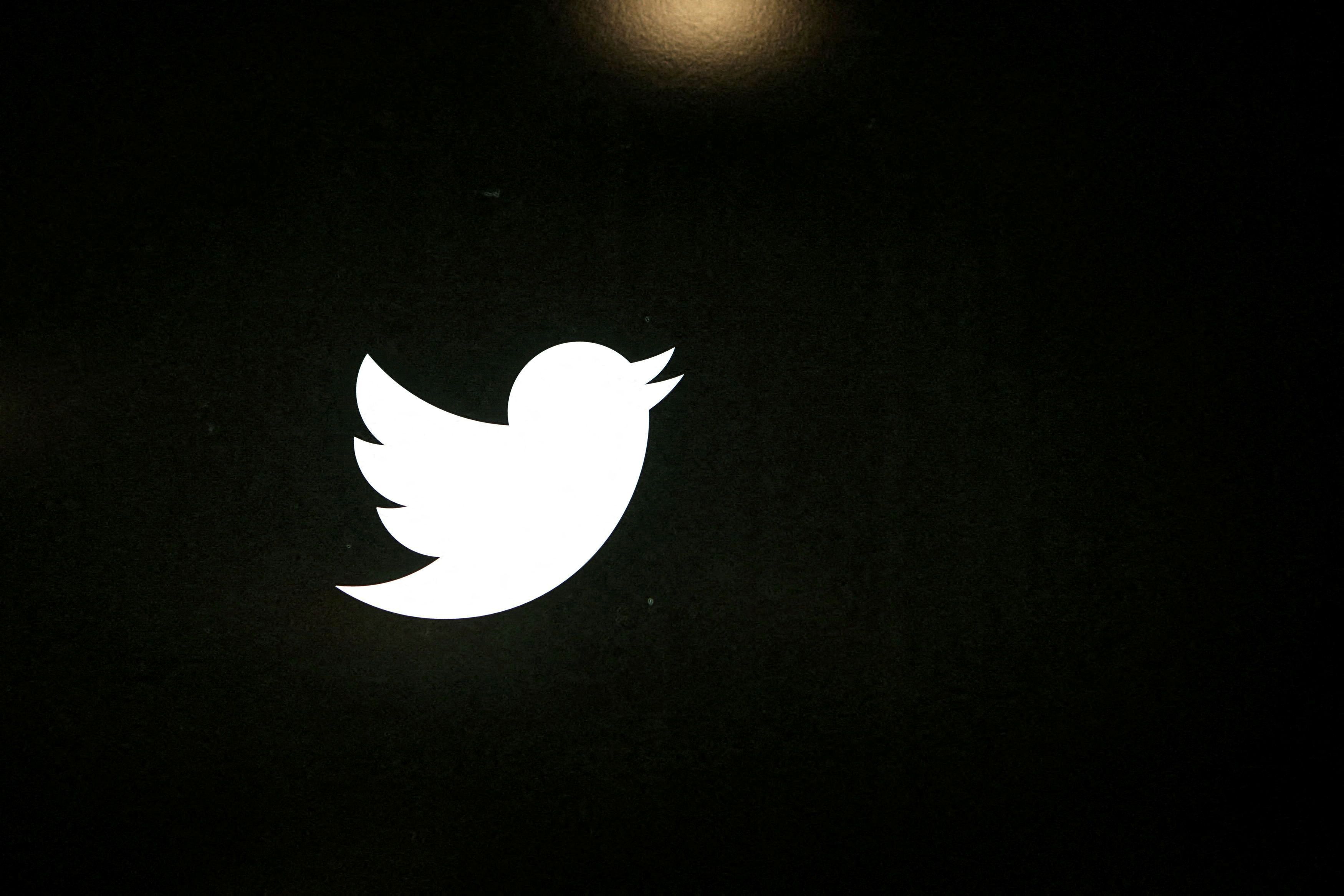 The Twitter logo is seen at the company's headquarters in San Francisco