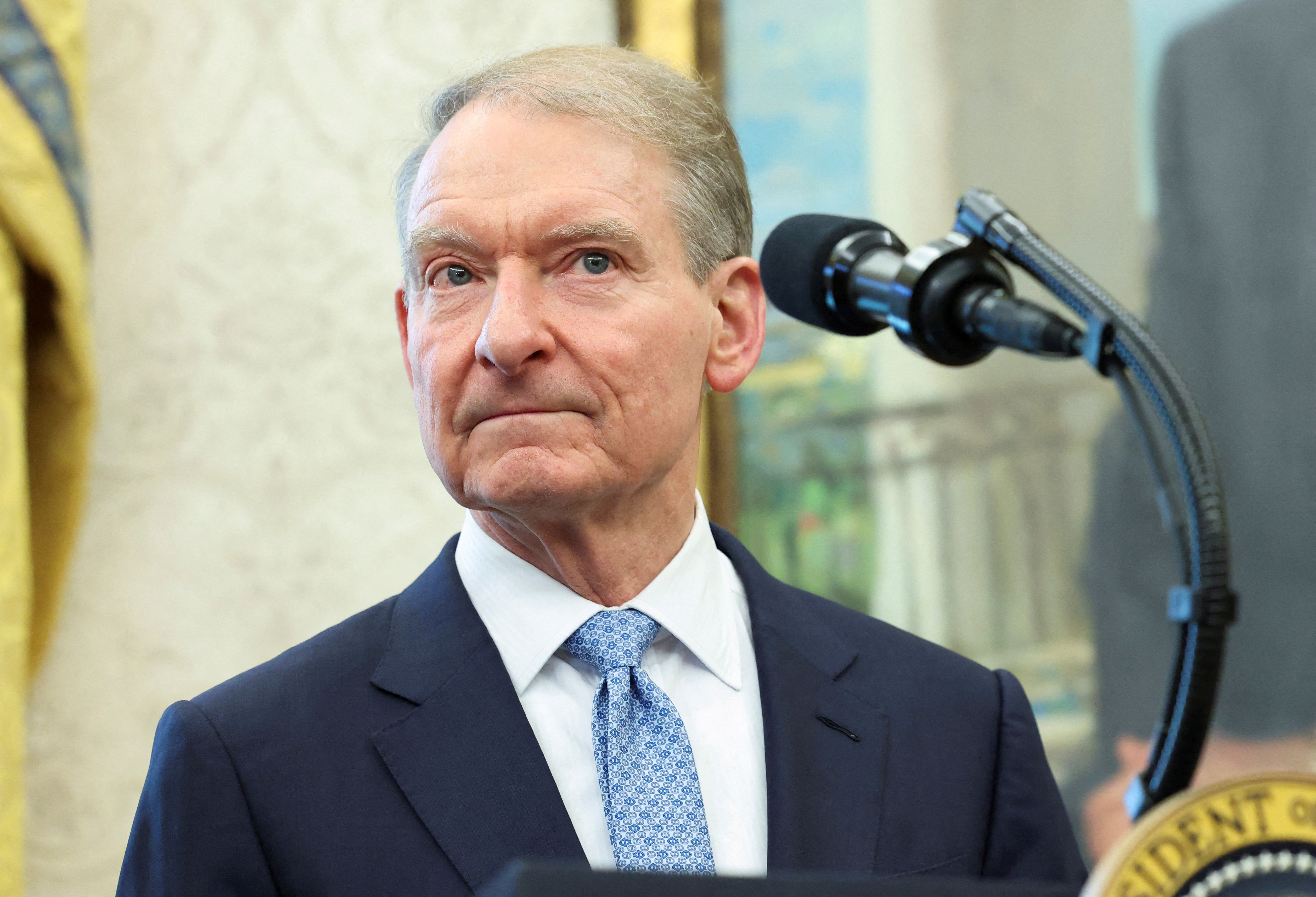 US SEC chair says agency plans to create new rules for crypto tokens |  Reuters