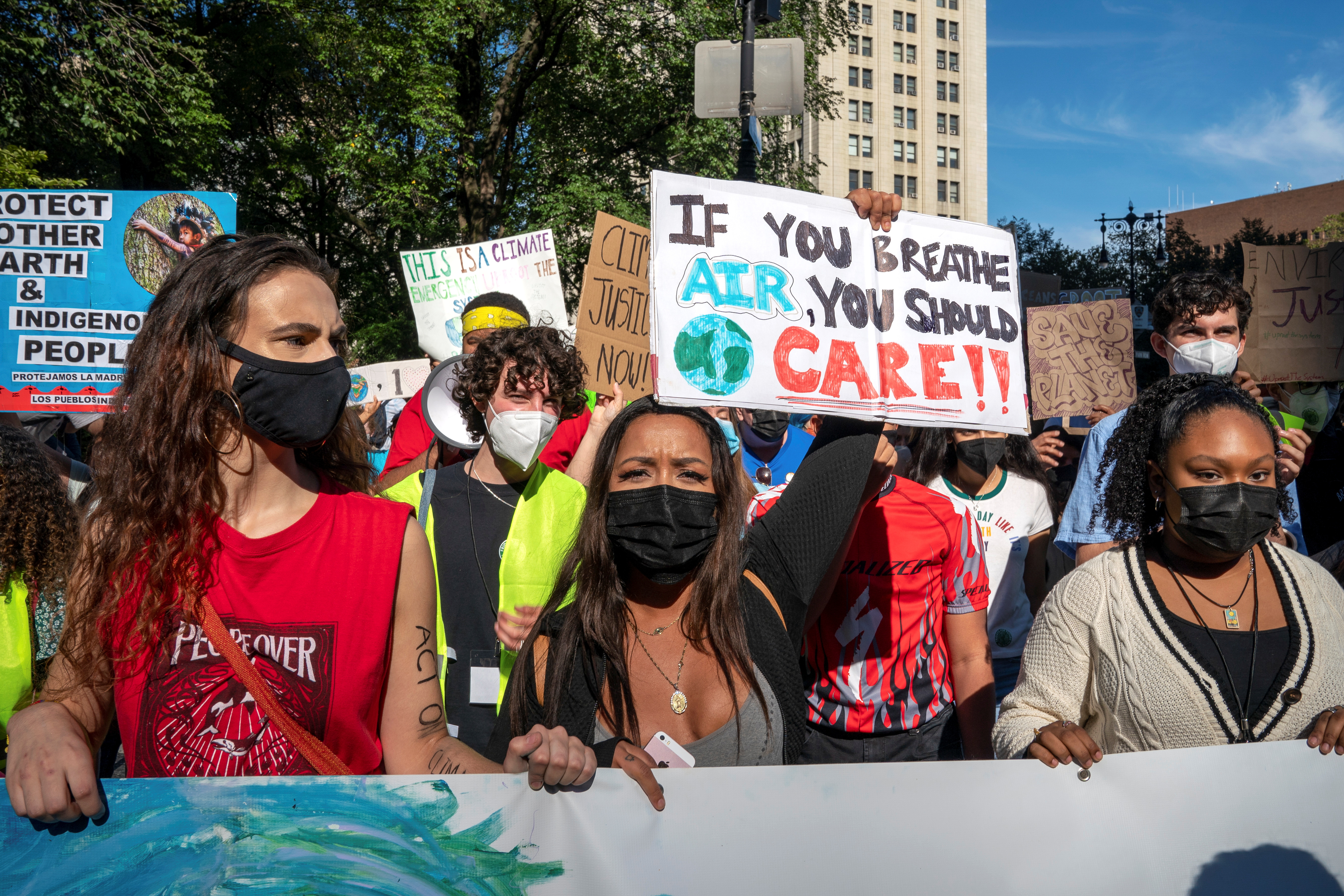People participate in a Global Climate Strike in New York City, U.S., September 24, 2021.  REUTERS/David 'Dee' Delgado/Files