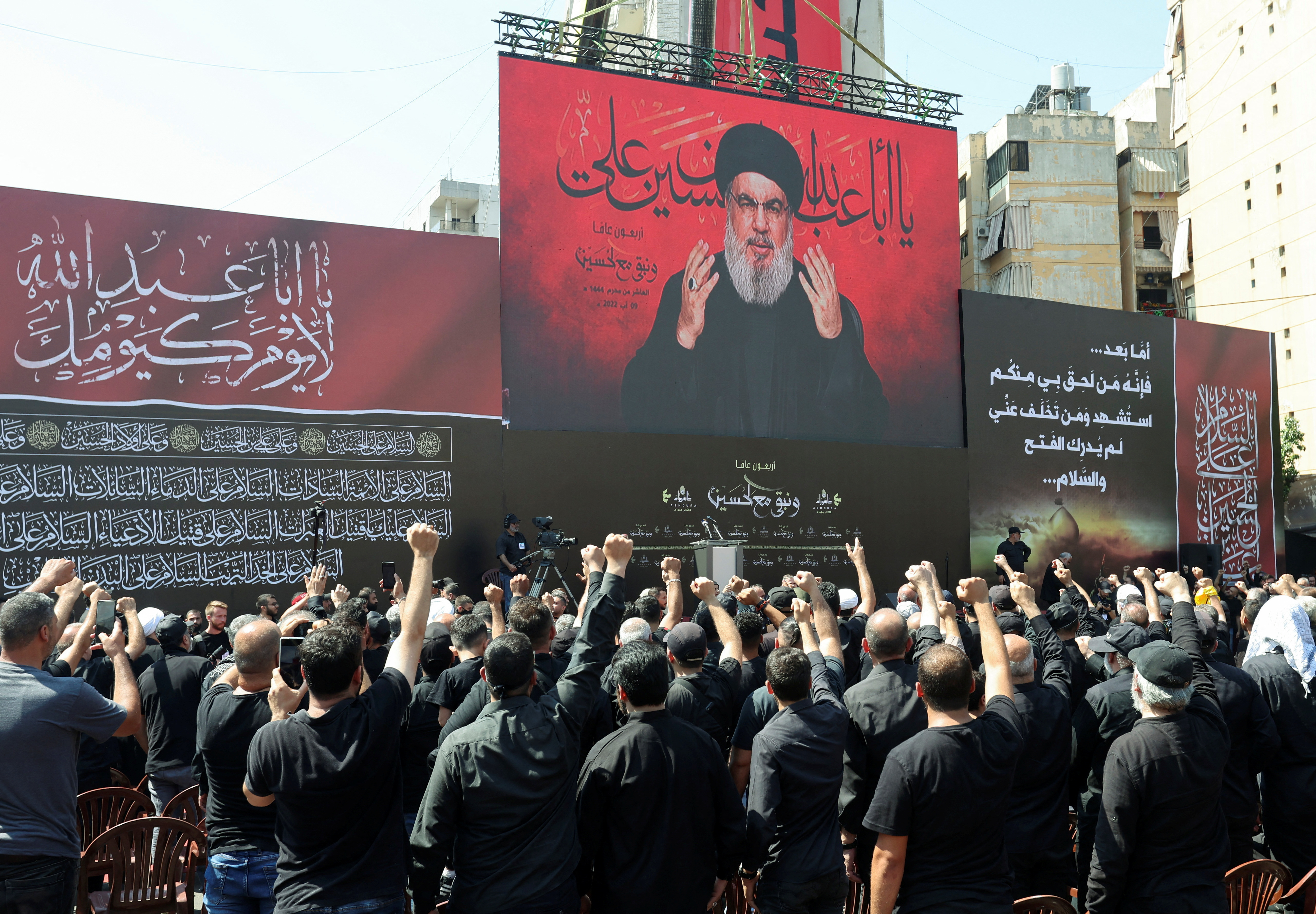 Lebanon's Hezbollah leader Sayyed Hassan Nasrallah addresses his supporters in Beirut's suburbs