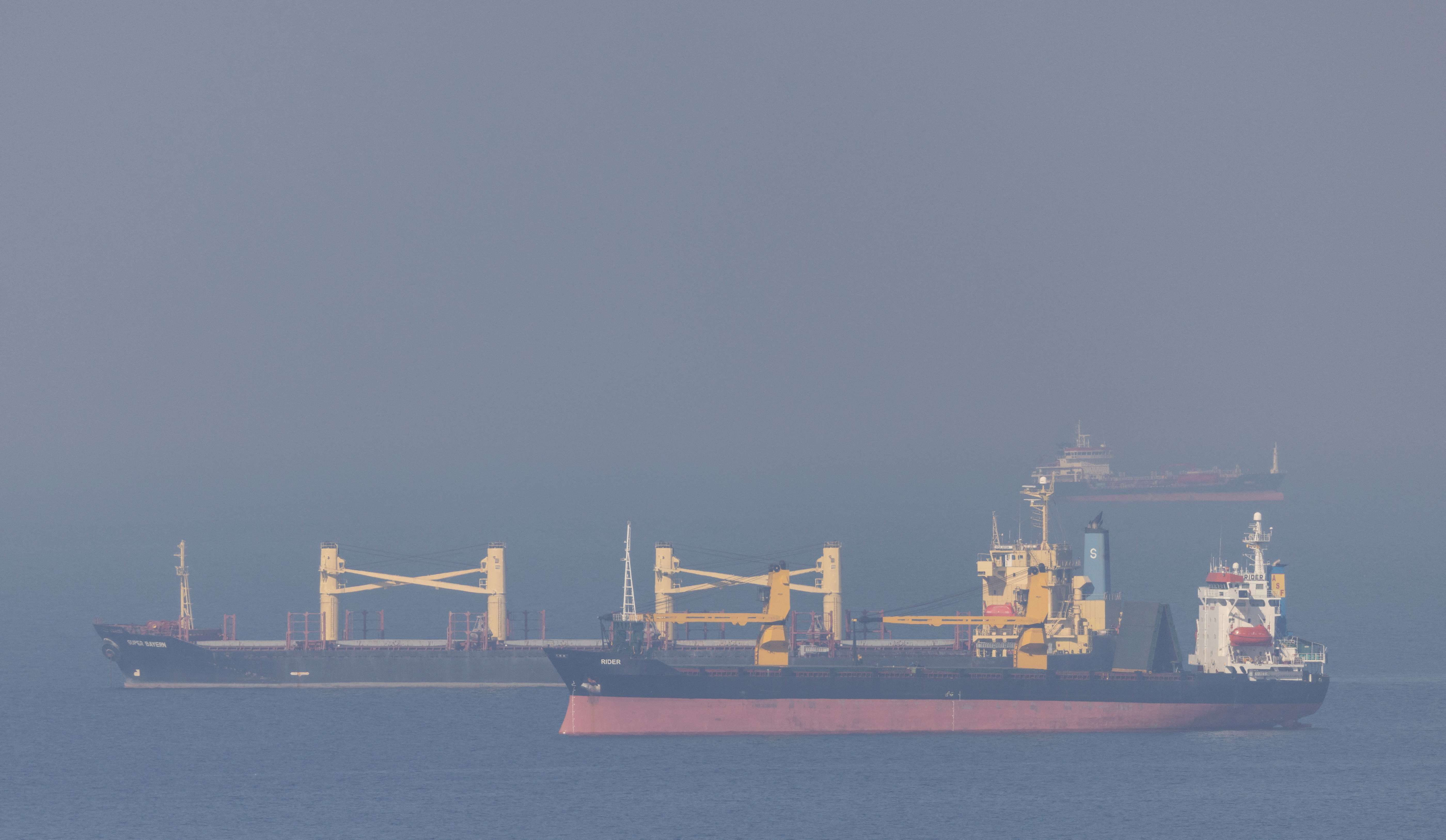 Cargo ship Super Bayern, carrying Ukrainian grain, is seen behind cargo ship Rider in the Black Sea off Kilyos near Istanbul