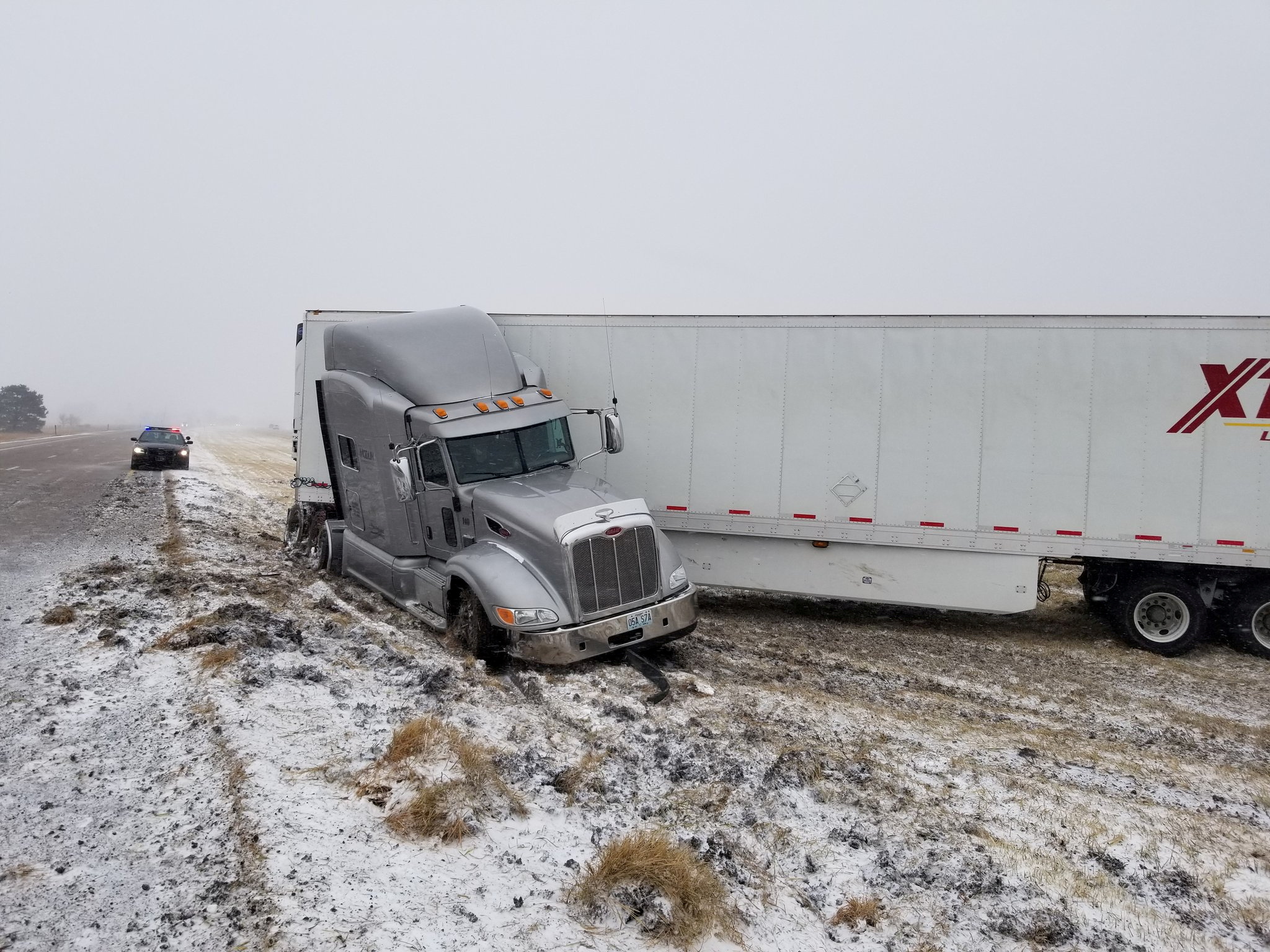 A tractor trailer sits on the side of the highway during a post-Christmas blizzard in this photo provided by the Nebraska State Patrol, in Grand Island, Nebraska, U.S., December 28, 2018.  Nebraska State Patrol/Handout via REUTERS/File Photo