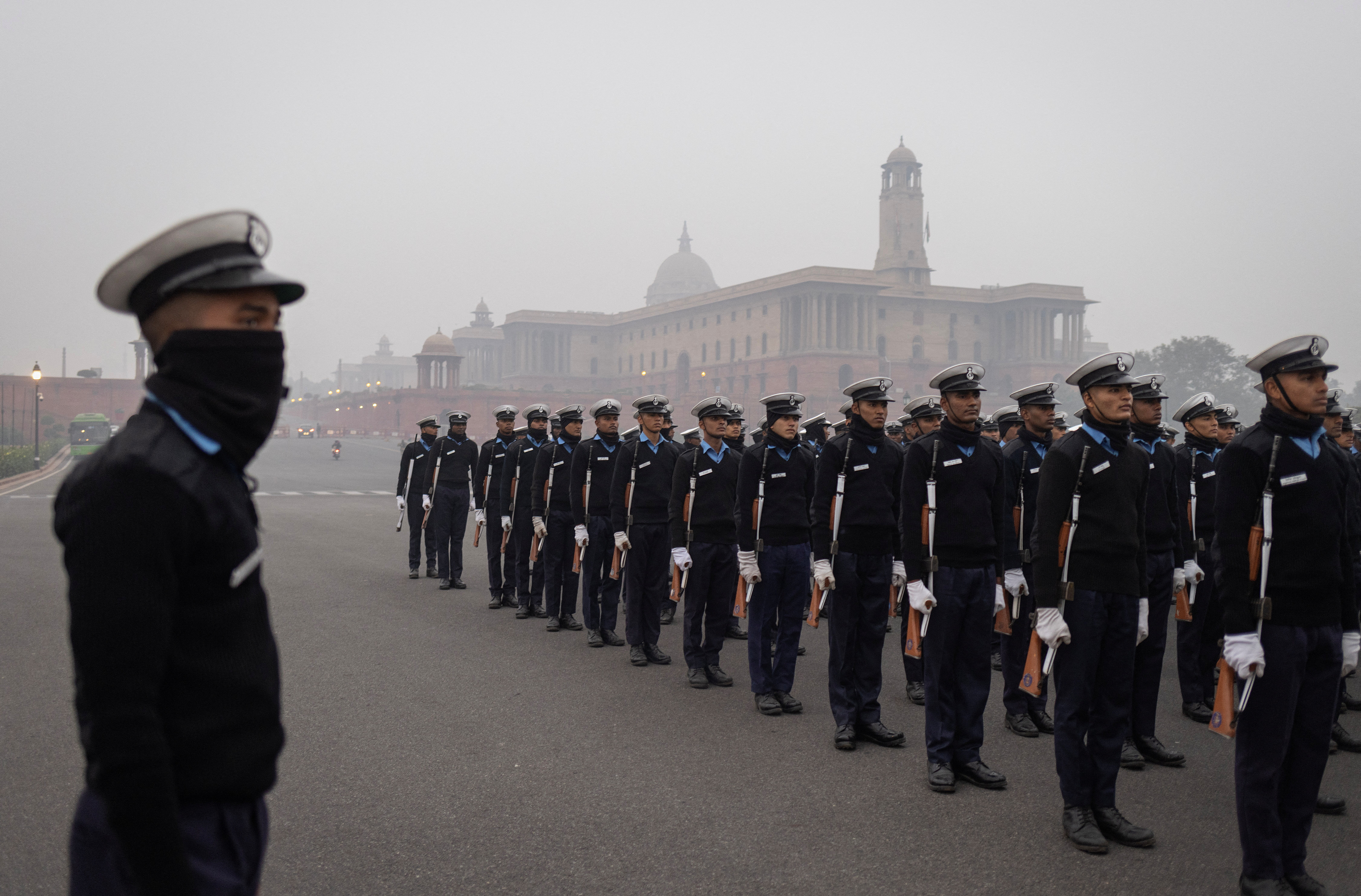 Indian Navy soldiers rehearse for the Republic Day parade on a cold winter morning in New Delhi