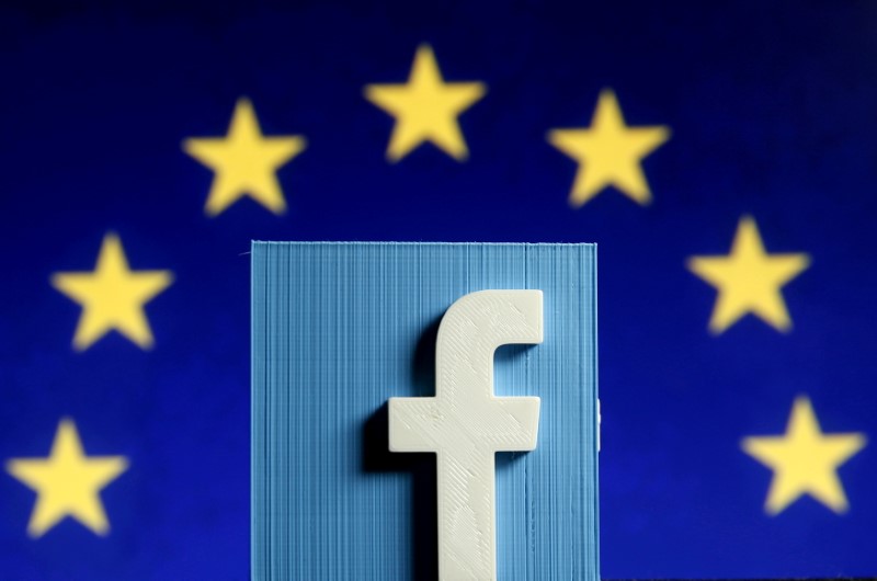 Facebook logo in 3D in front of the EU flag, May 15, 2015.  REUTERS/Dado Ruvic