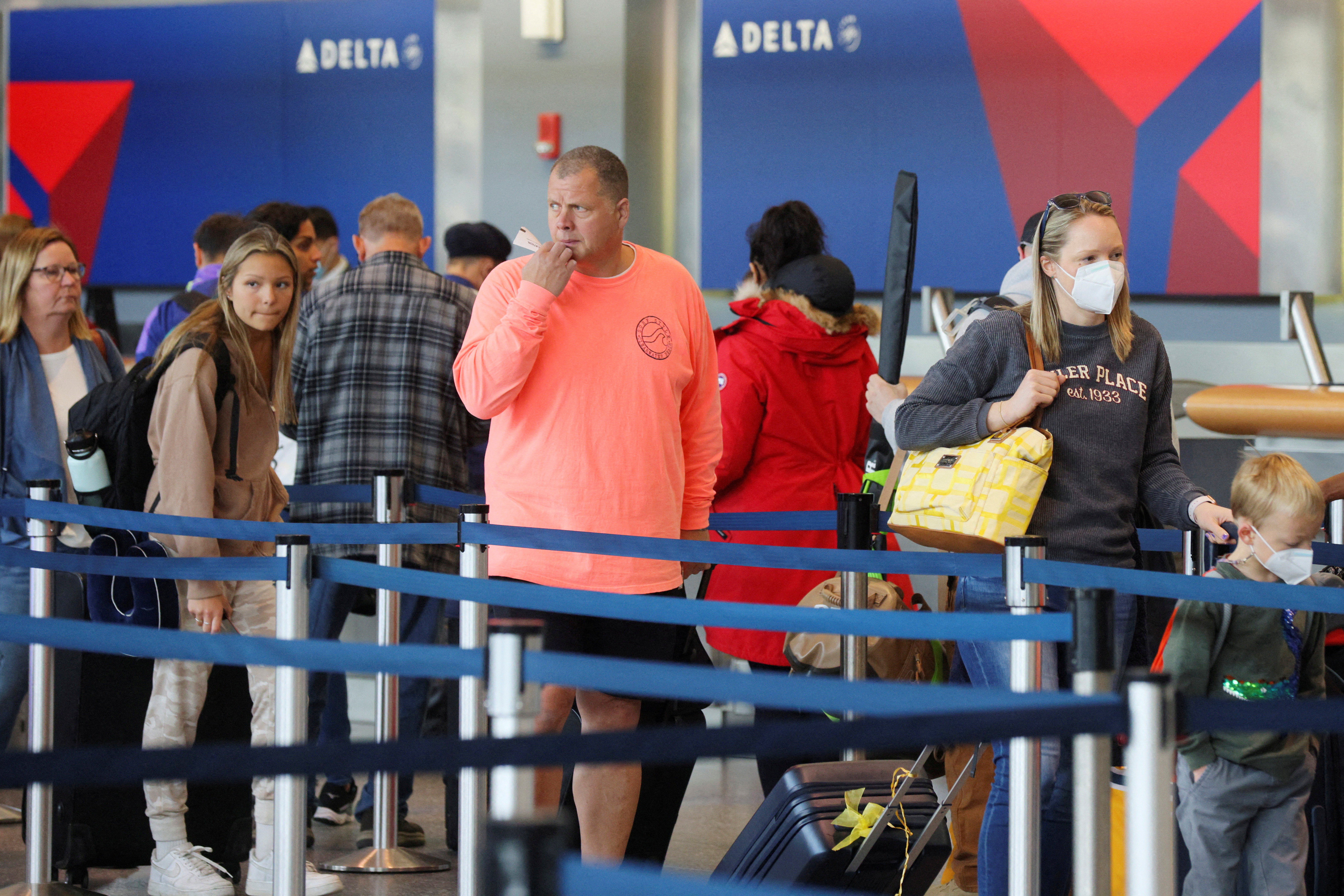 Travellers at Logan Airport after mask mandate struck down in Boston