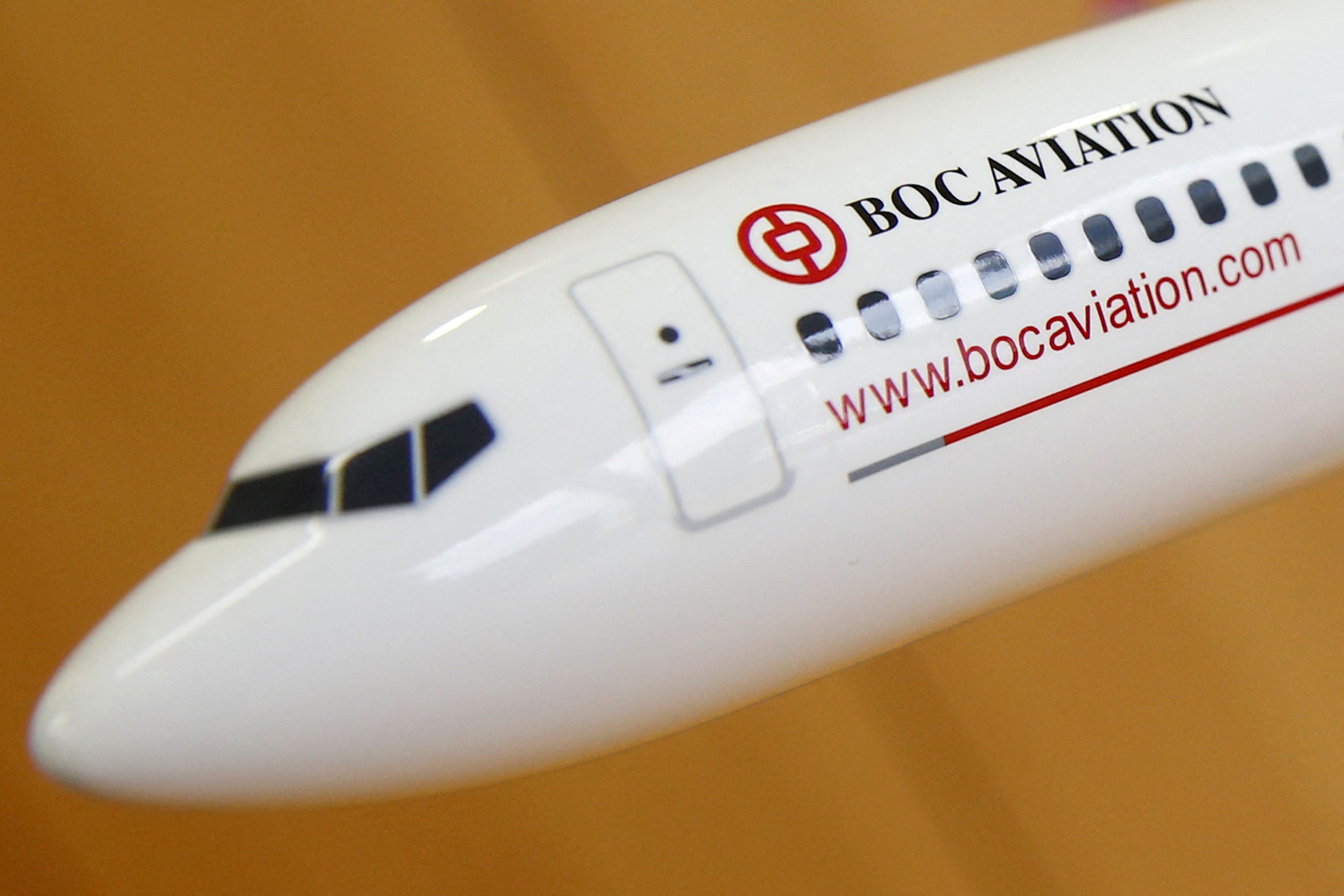 A photo illustration of a BoC Aviation model plane at their office in Singapore