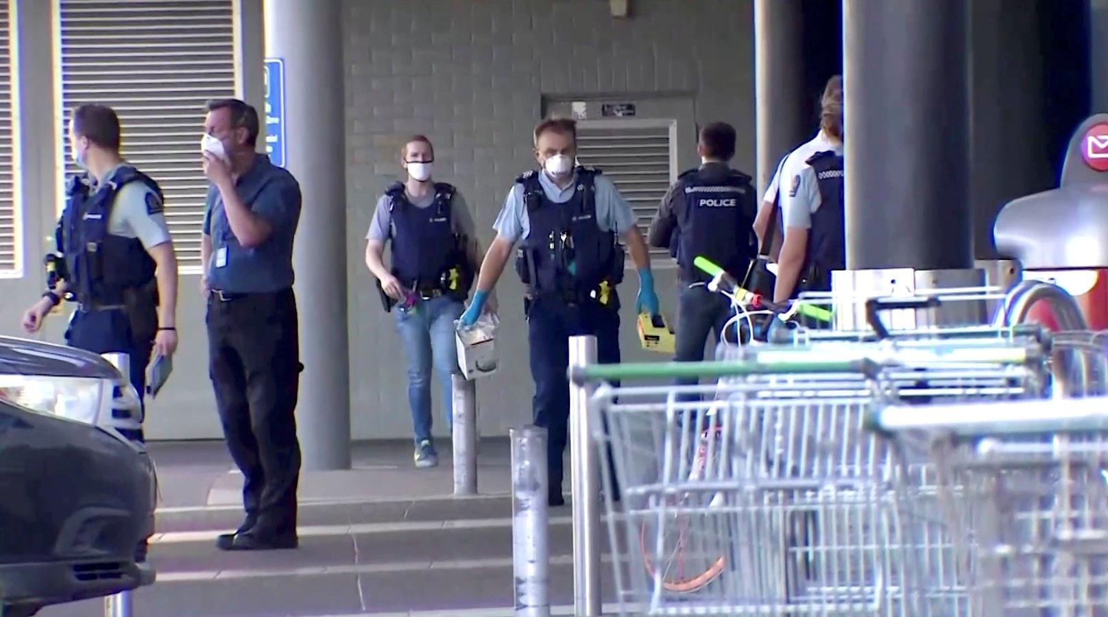 A screen grab shows police officers working outside a shopping mall following a knife attack in Auckland, New Zealand September 3, 2021. TVNZ via Reuters TV 