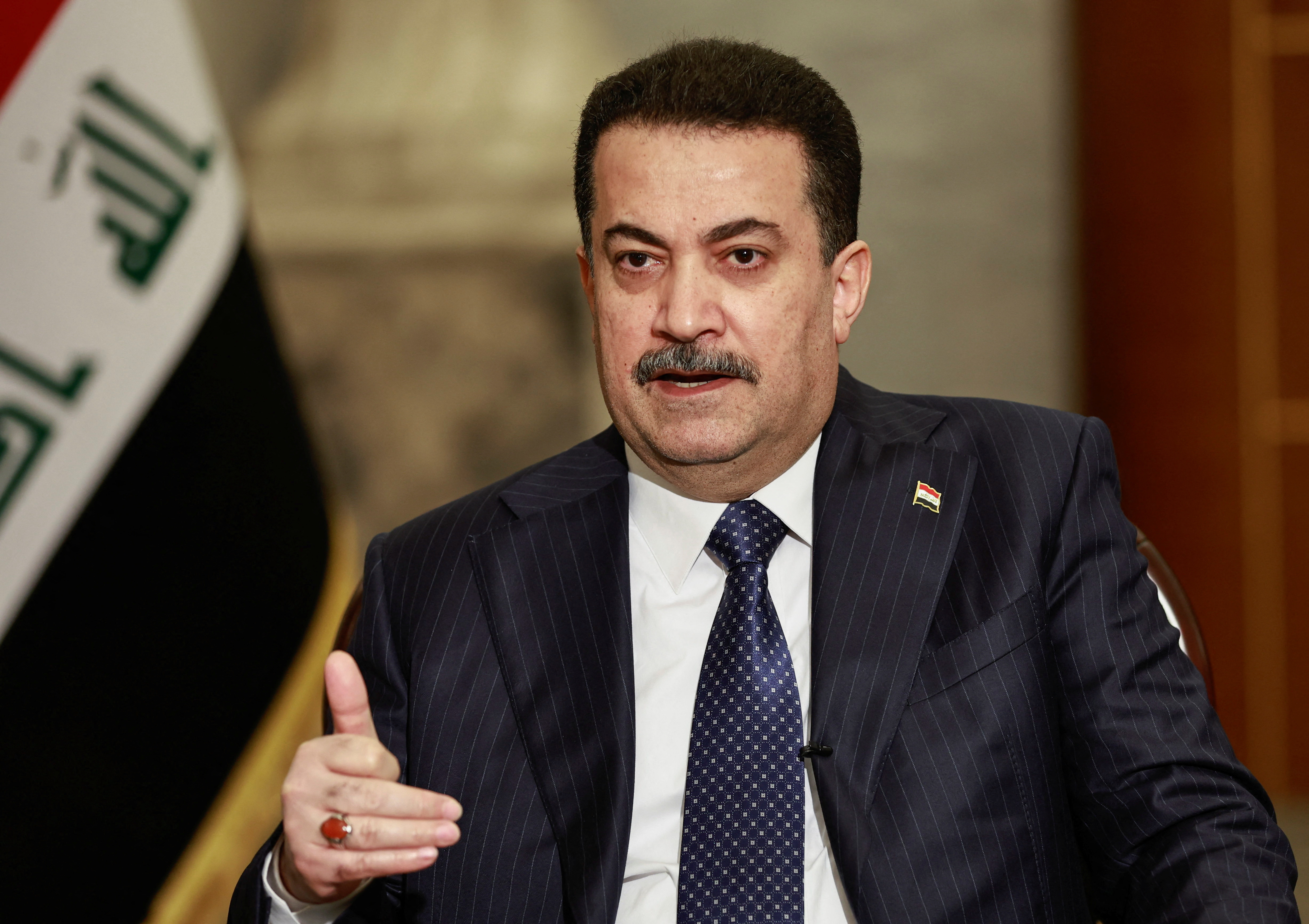 Iraqi Prime Minister Mohammed Shia al-Sudani speaks during an interview with Reuters in Baghdad