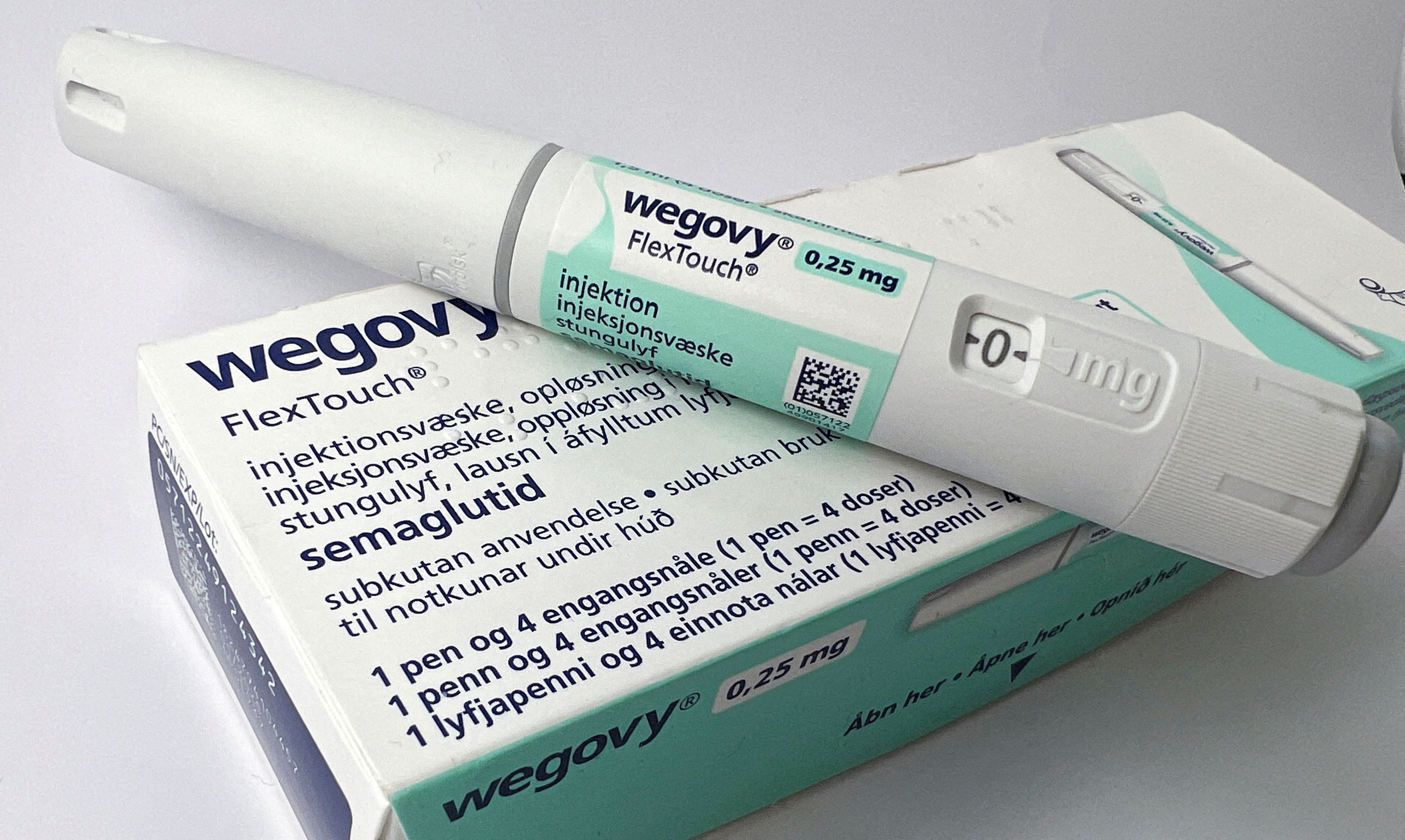 This photo illustration from Oslo shows an injection pen for Novo Nordisk's weight loss drug Wigoby