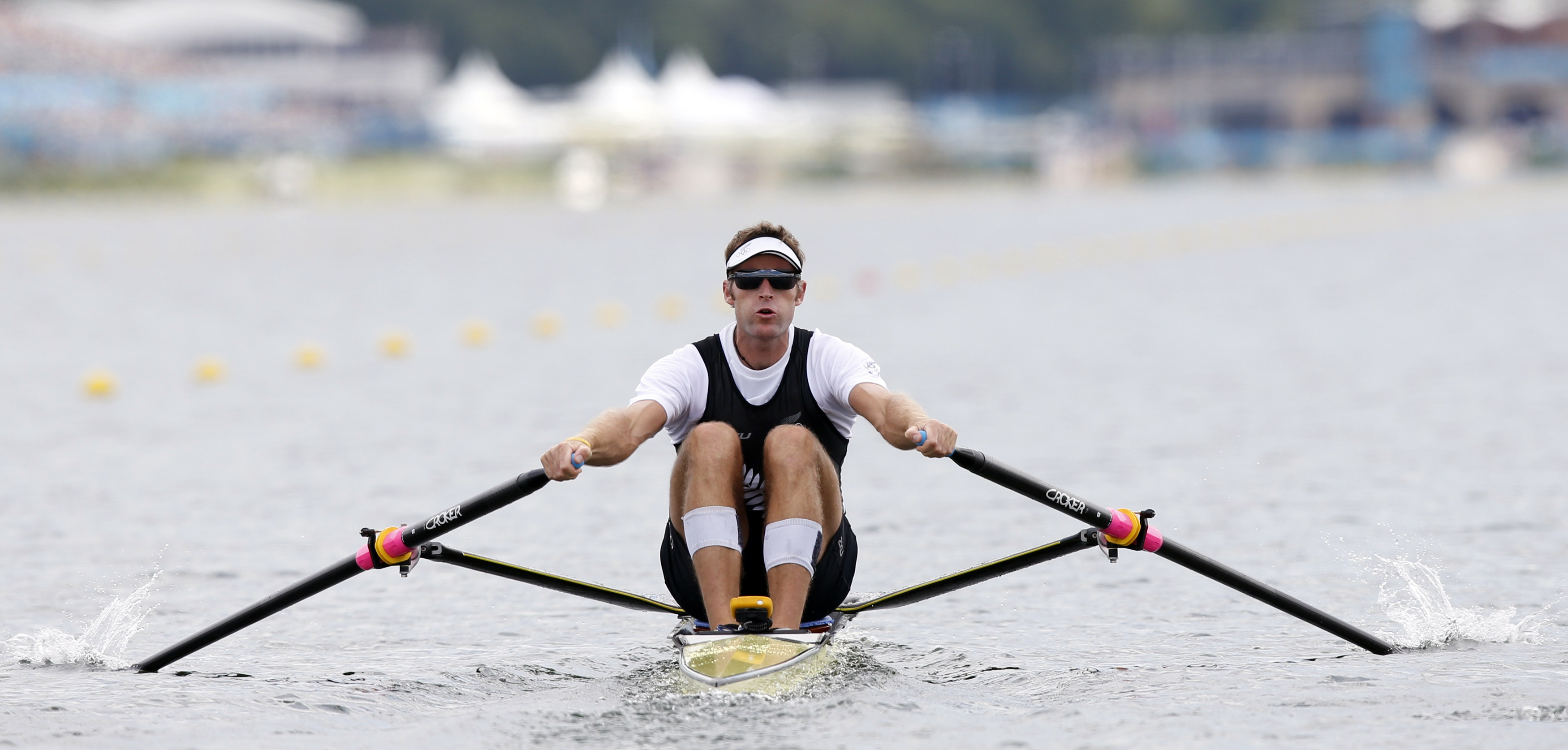 New Zealand's Mahe Drysdale rows during the men's rowing single sculls heat at the Eton Dorney during the London 2012 Olympic Games
