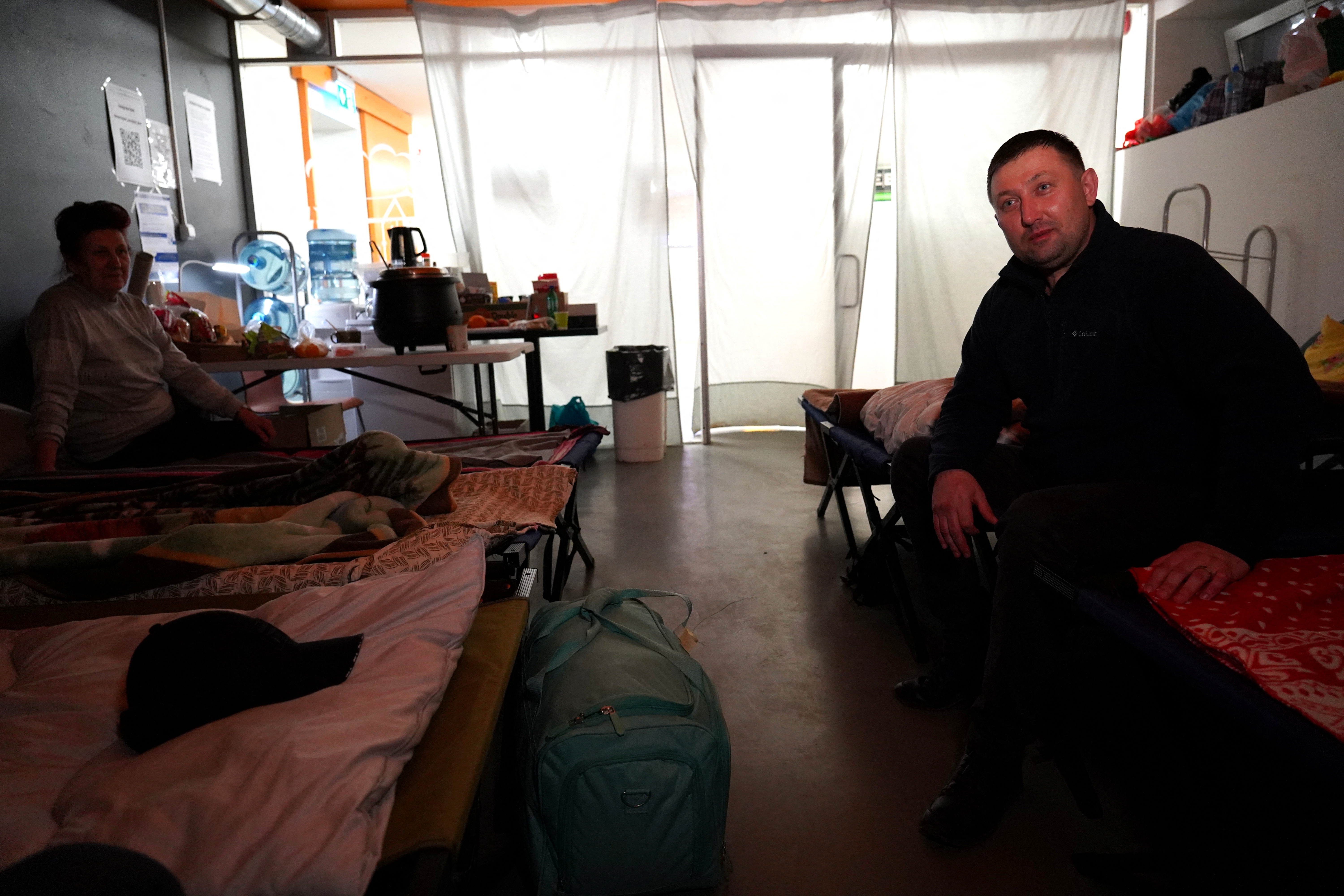 Ukrainian refugees arrive via buses at the welcome center and sleeping facilities at Tallinn Bus Station