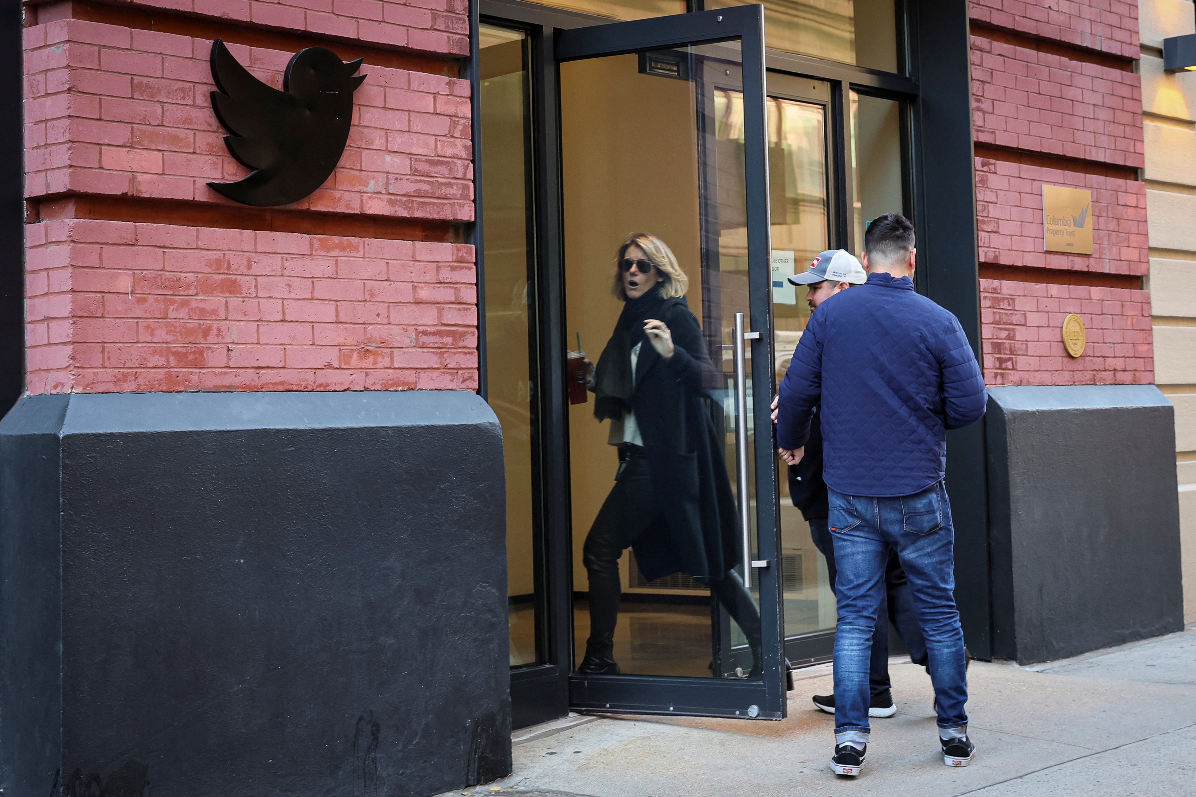 Twitter employees are seen entering the offices in New York City, U.S., November 9, 2022.