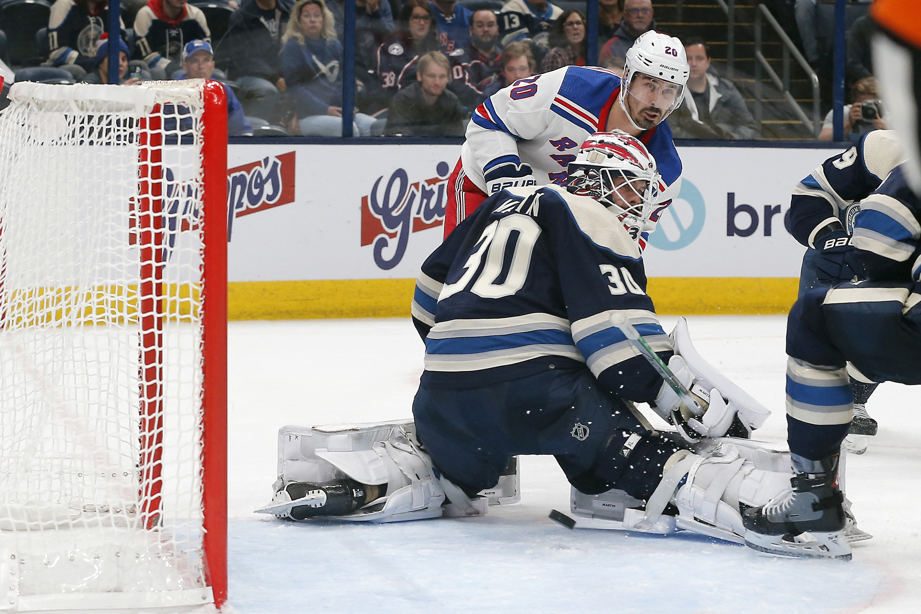 Boone Jenner's natural hat trick propels Jackets past Rangers | Reuters