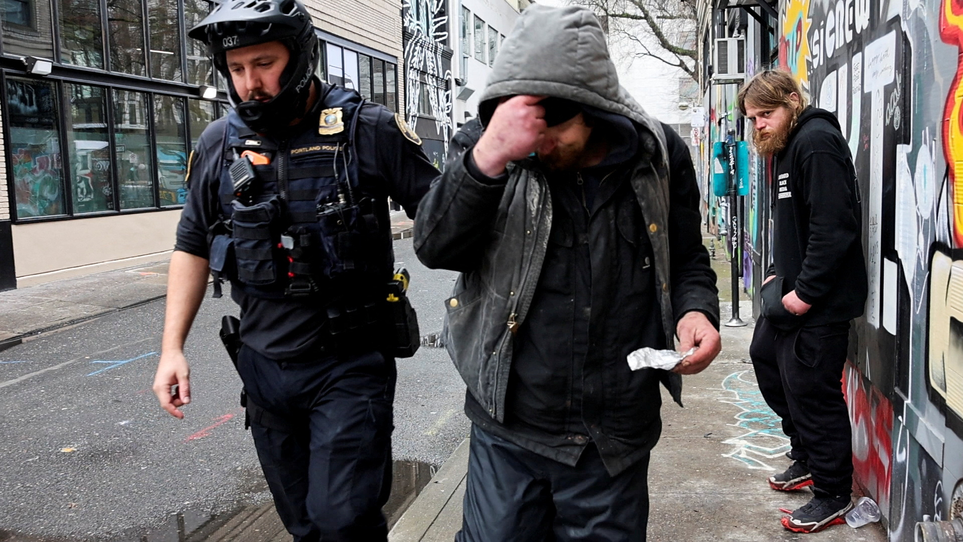 Police officer issues a citation to a man for smoking fentanyl in Portland