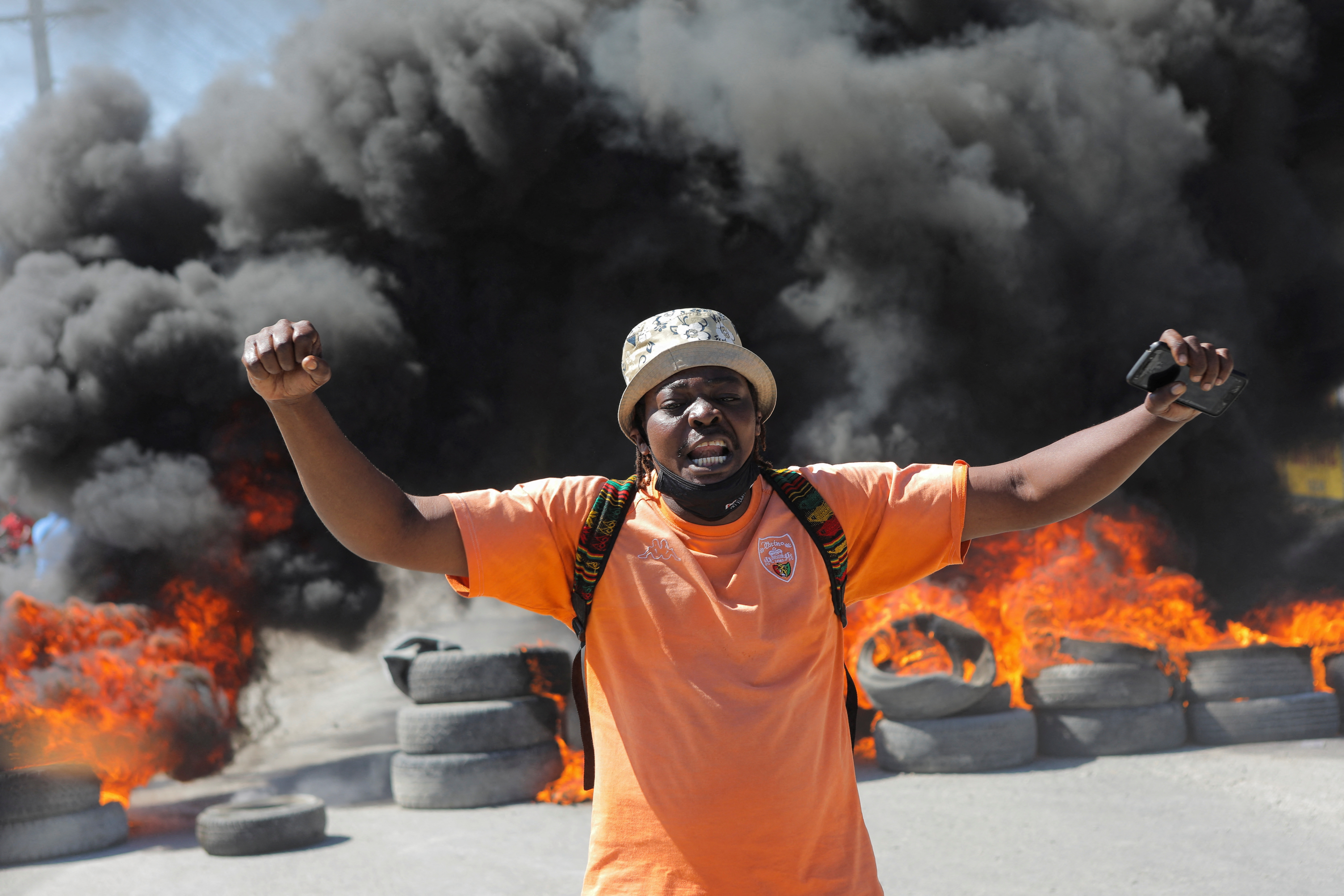 Demonstrators protest the recent killings of police officers by armed gangs, in Port-au-Prince