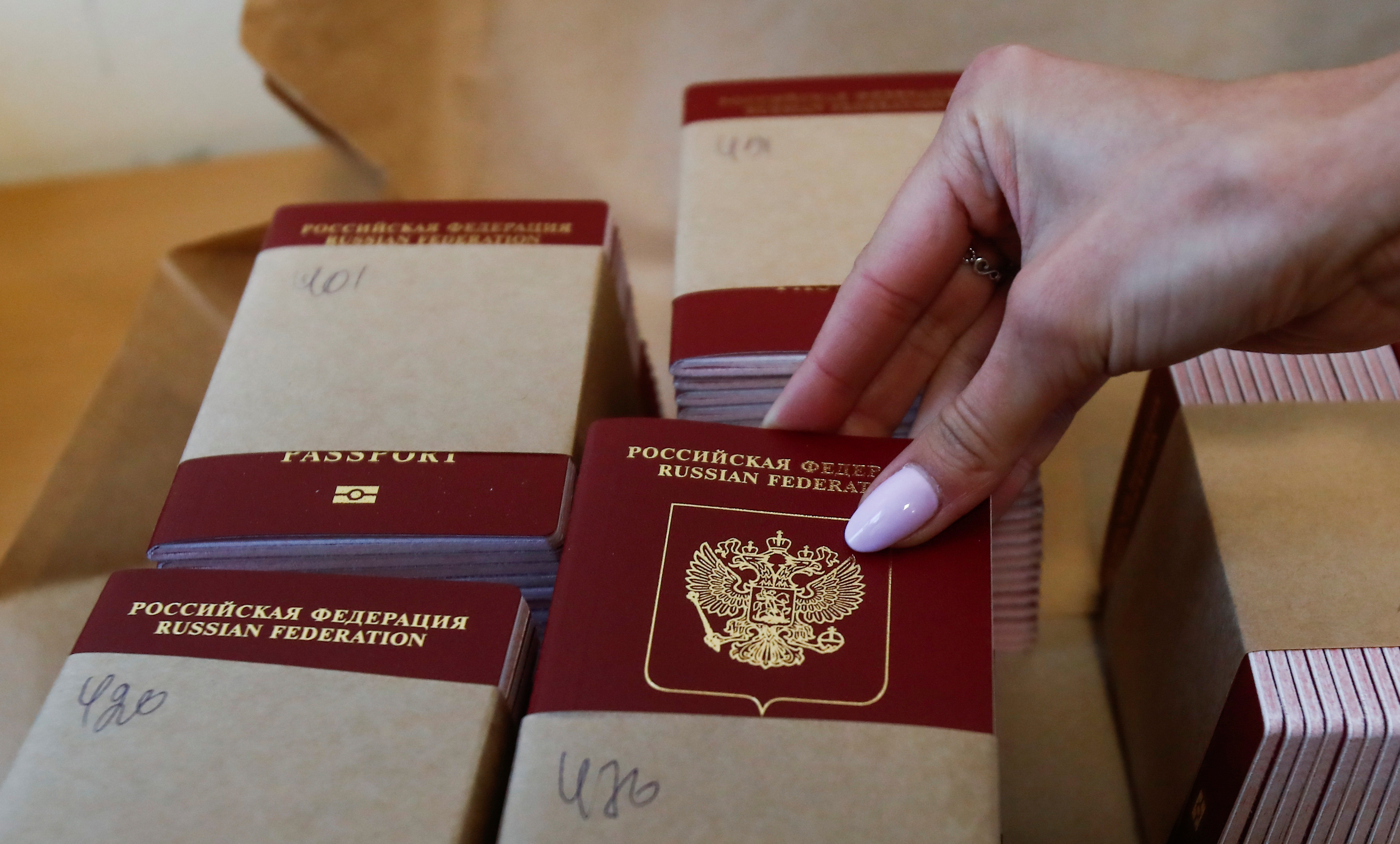 Russian passports are pictured at Goznak printing factory in Moscow