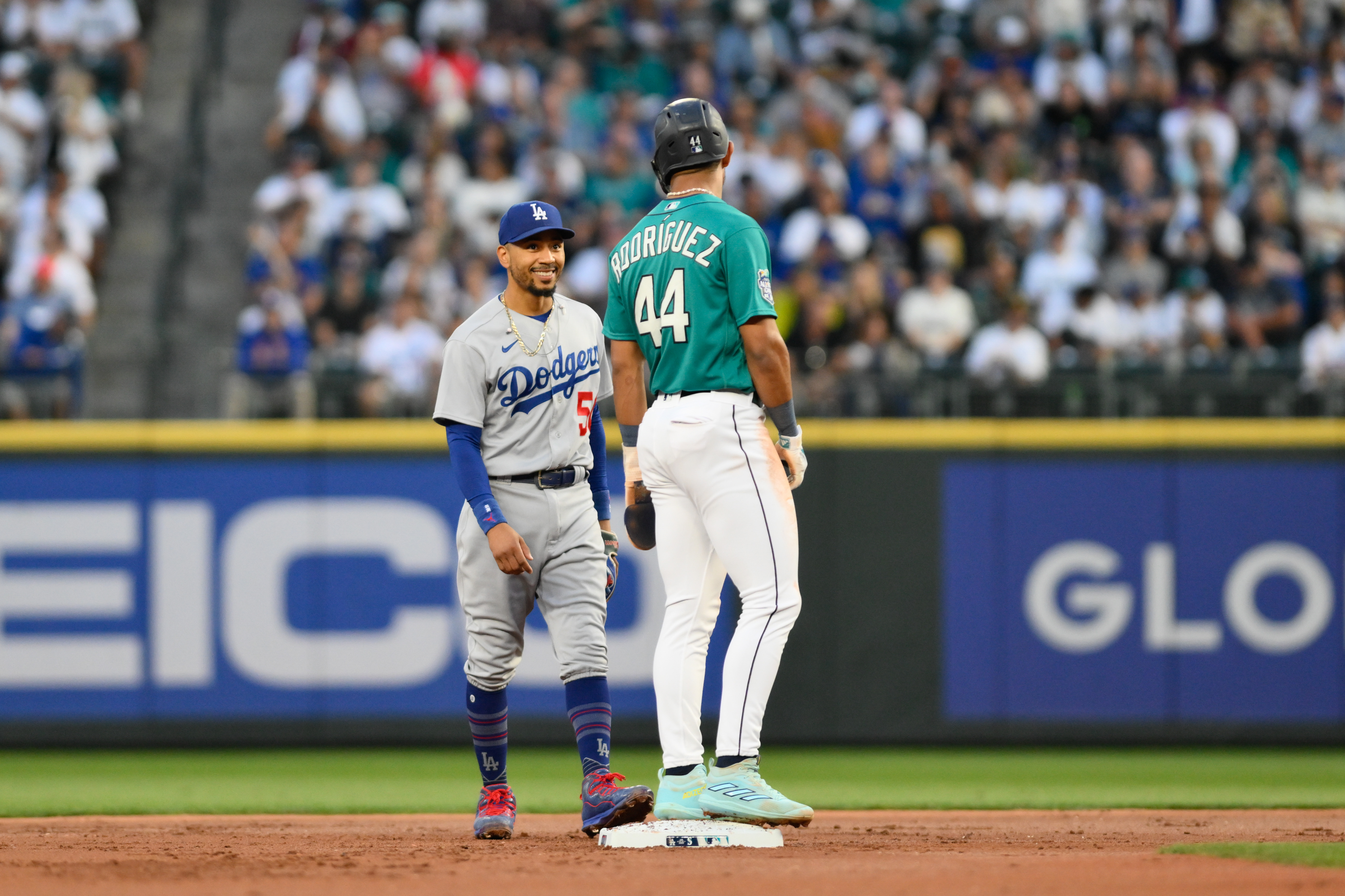 Dodgers clinch NL West title with 6-2 win over Mariners for 10th