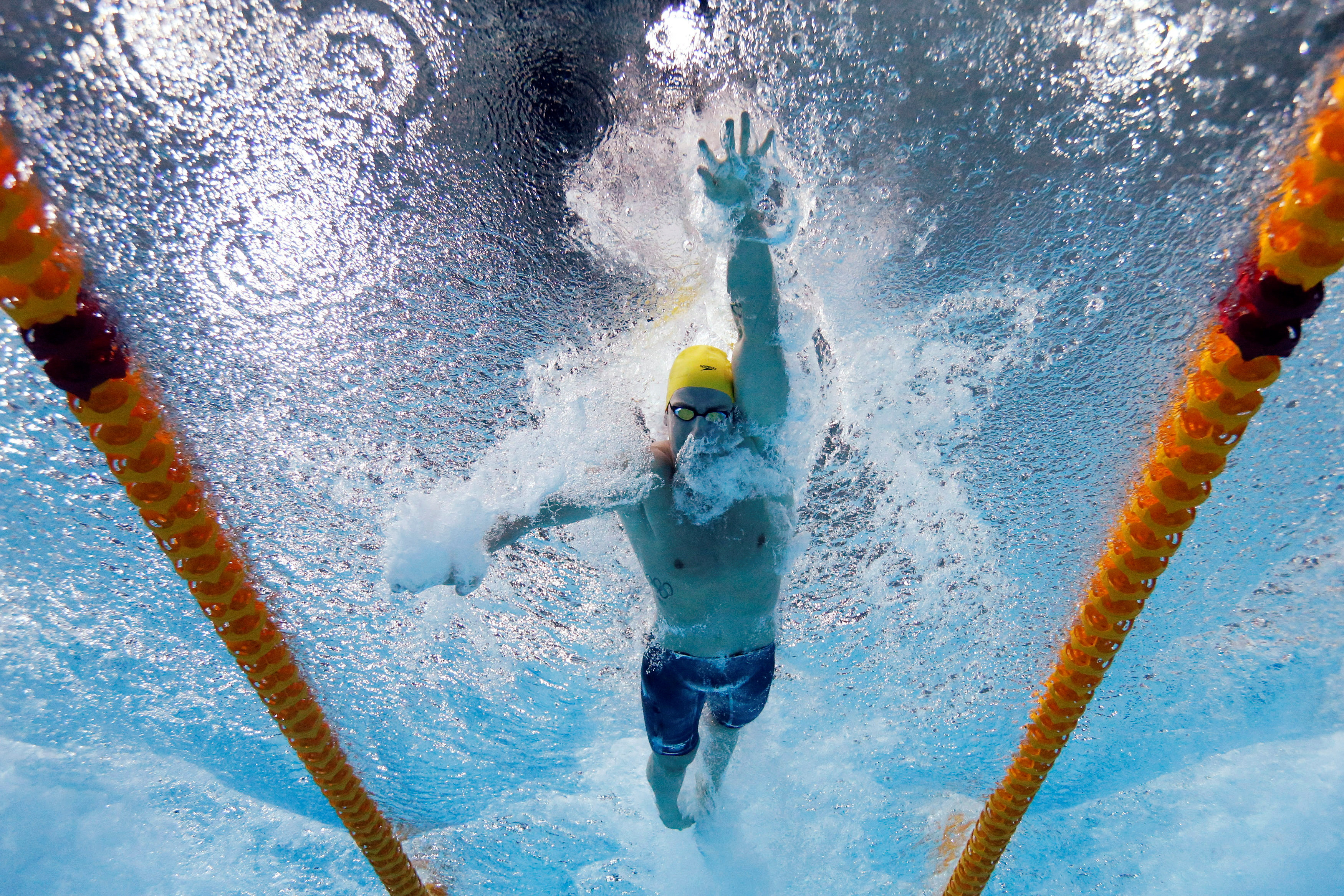 Magnussen of Australia is seen underwater as he swims in the men's 100m Freestyle final during the 2014 Commonwealth Games in Glasgow