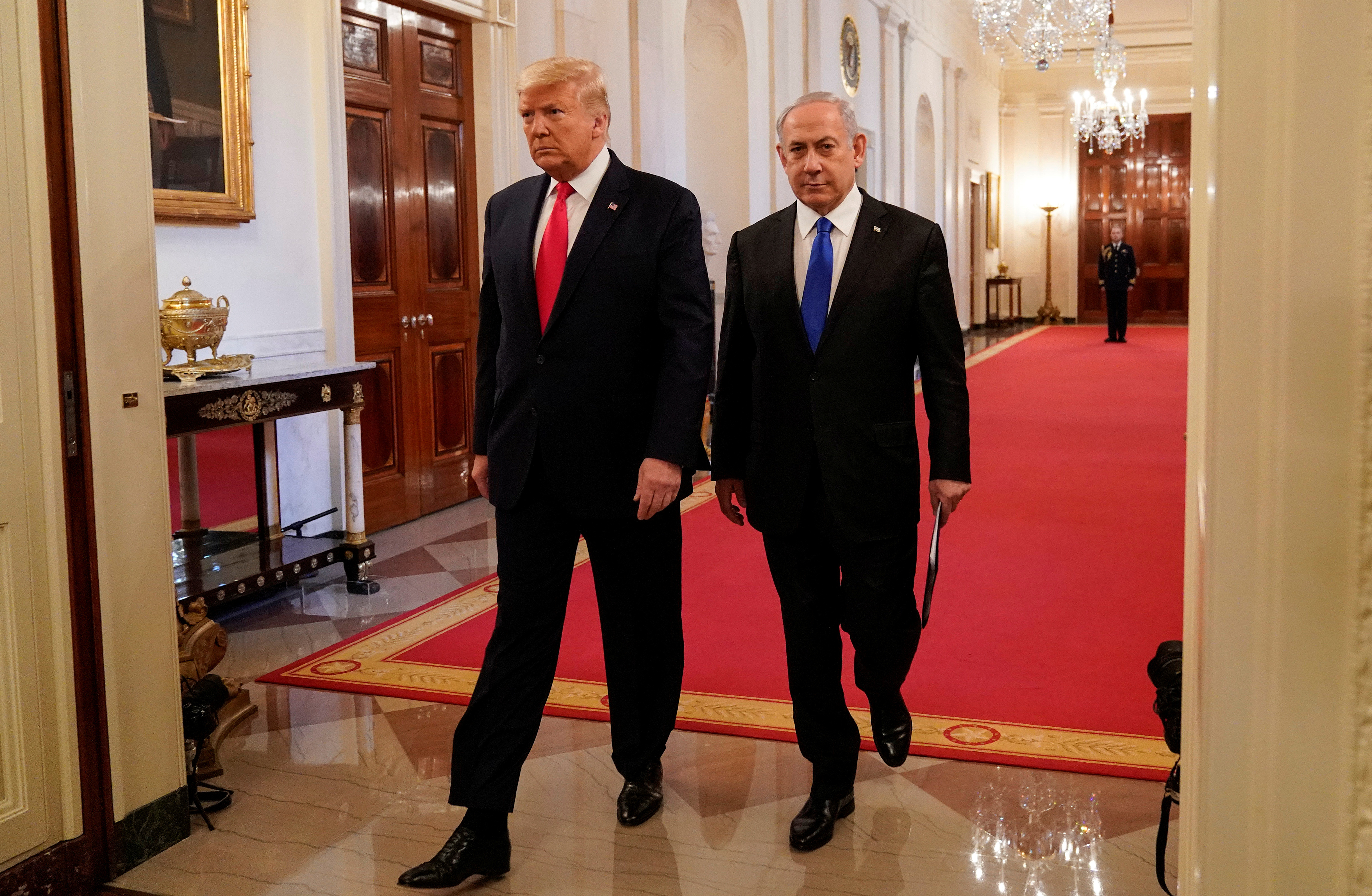 U.S. President Trump and Israel's Prime Mininister Netanyahu arrive to deliver joint remarks on Middle East peace plan proposal at the White House in Washington, U.S., January 28, 2020. REUTERS/Joshua Roberts