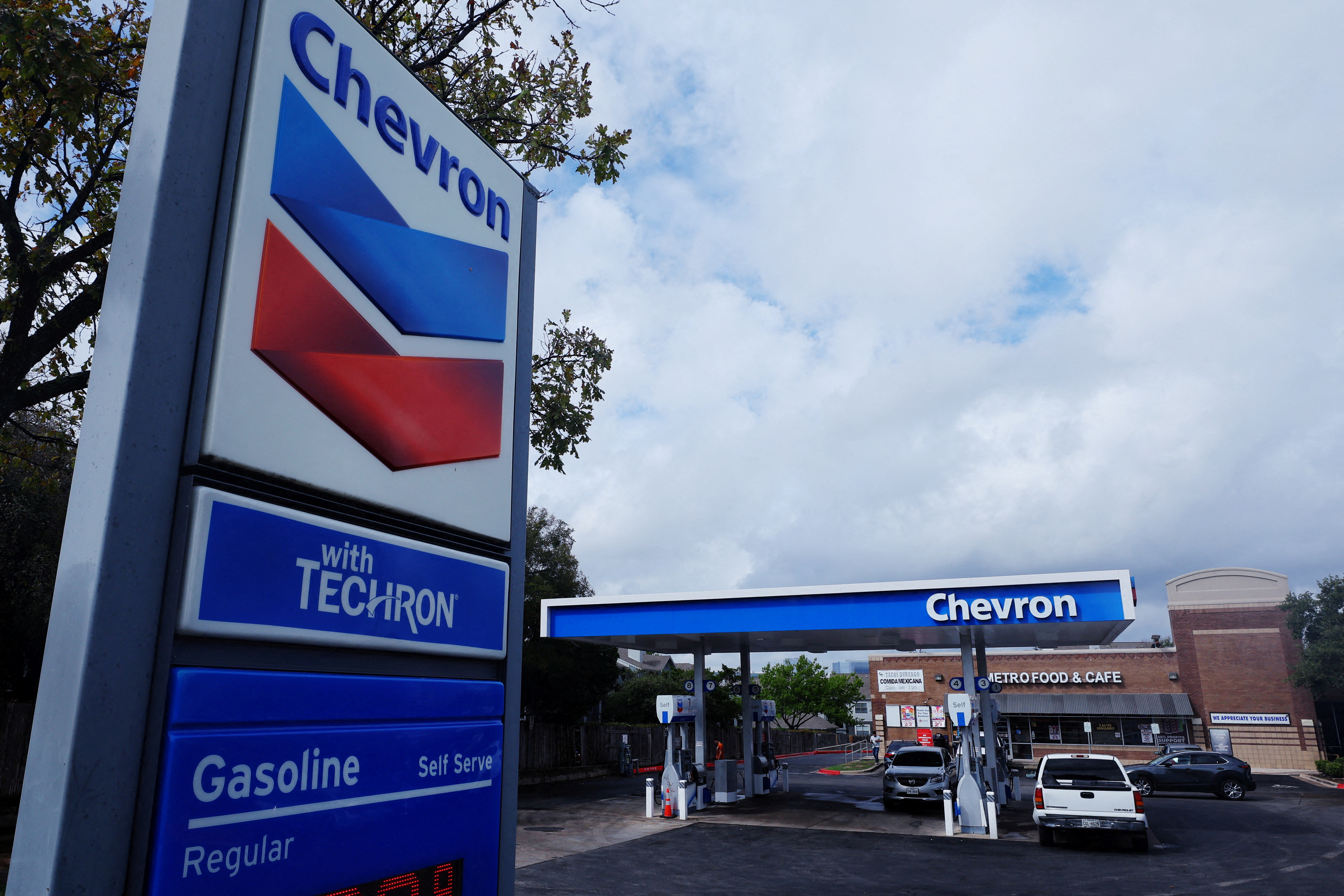 Chevron staffers absorb long-awaited layoffs as CEO pledges accountability  | Reuters