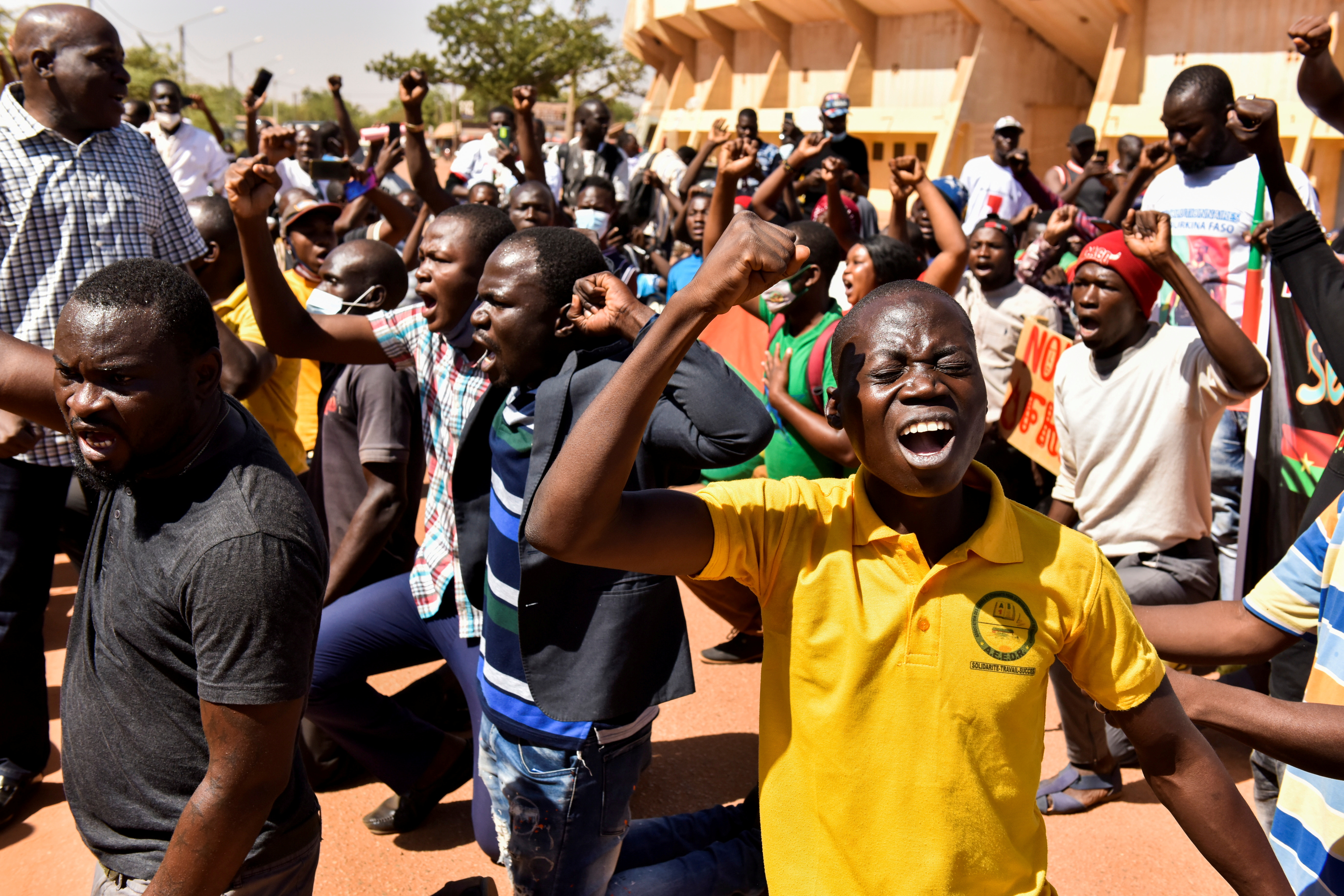 Civil society hold a protest following an attack on a gendarmerie post that killed 32 people, in Ouagadougou