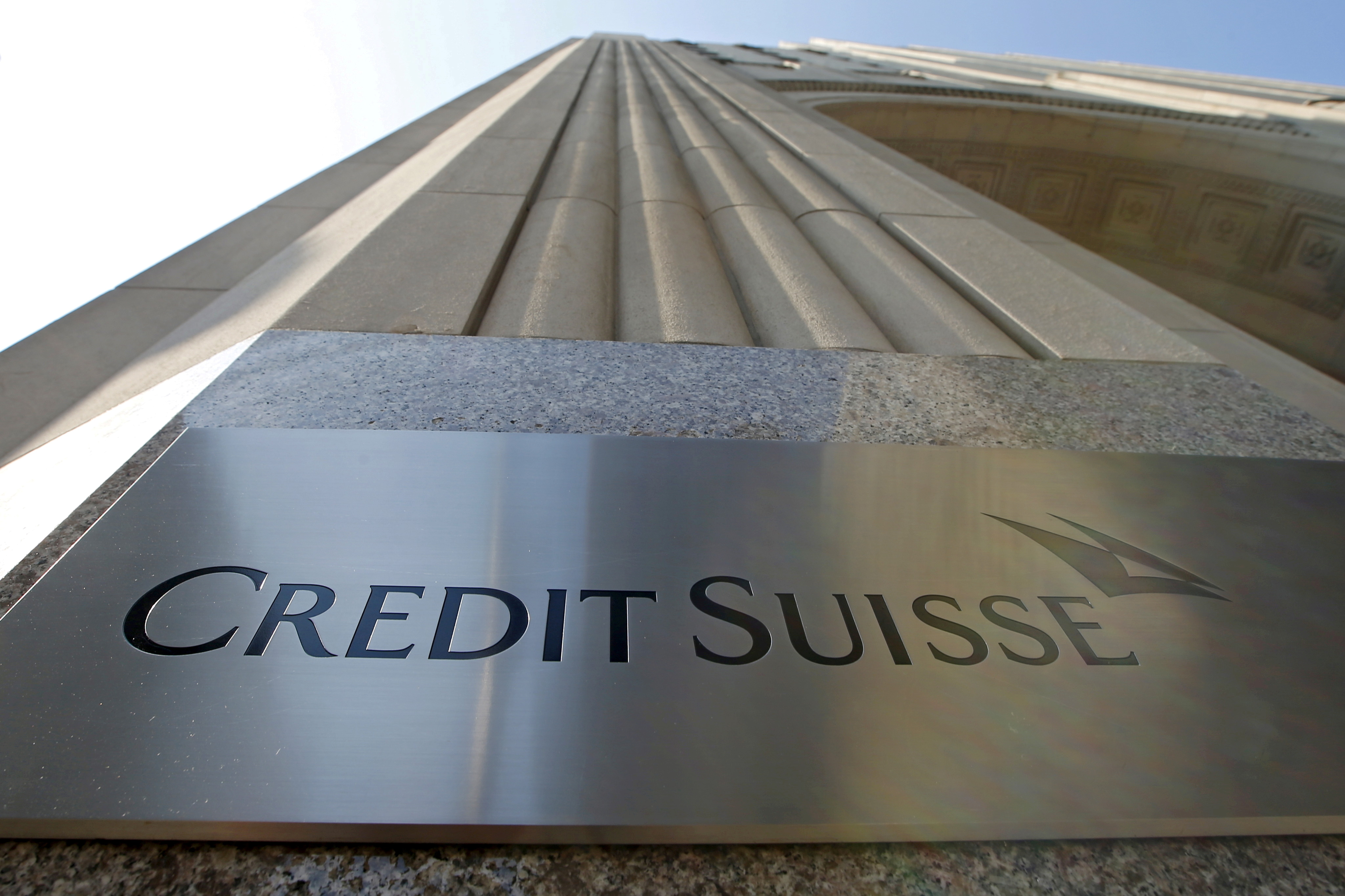 A Credit Suisse sign is seen on the exterior of their Americas headquarters in the Manhattan borough of New York City, September 1, 2015. REUTERS/Mike Segar/File Photo