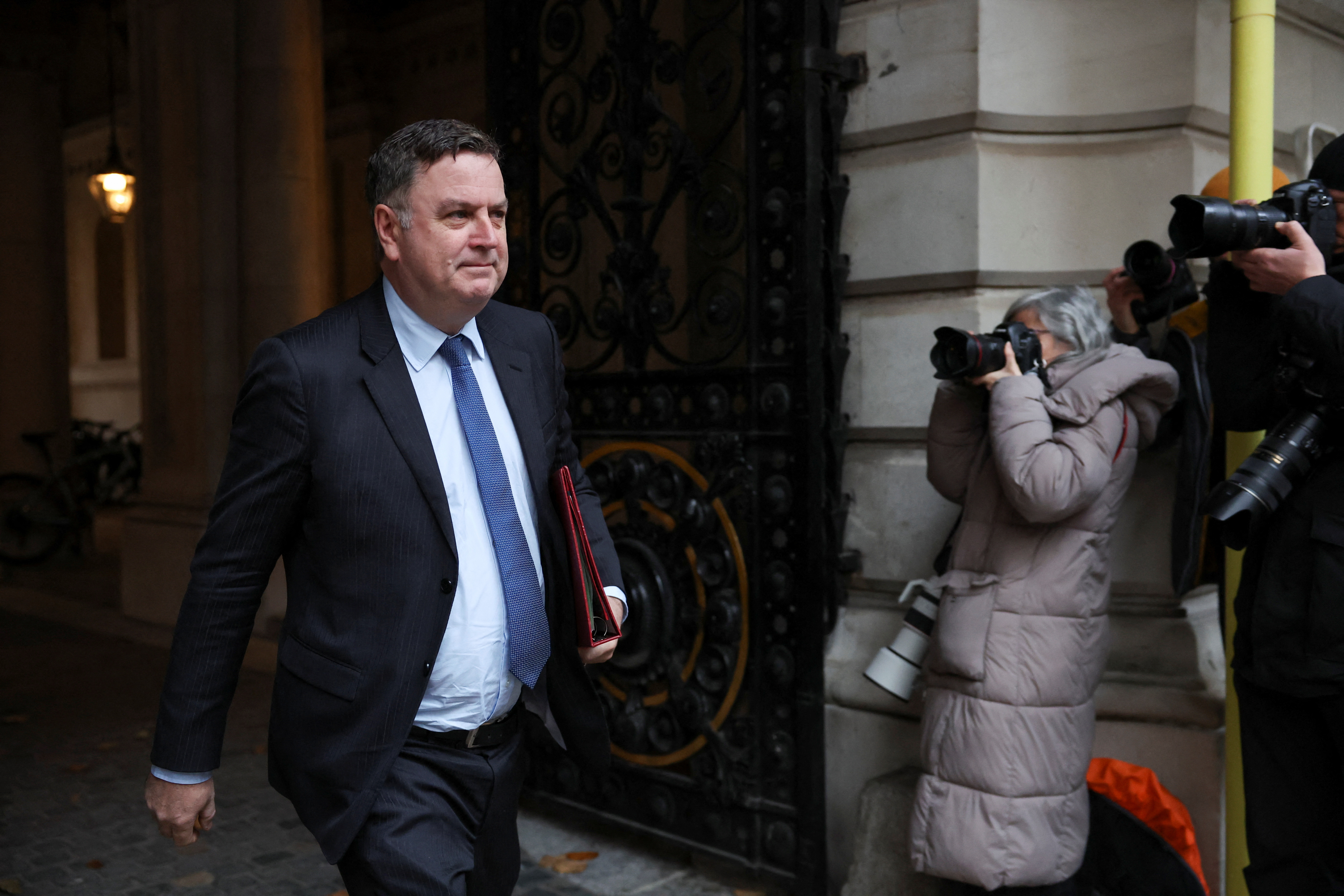 Britain's Secretary of State for Work and Pensions Stride walks on the day of a cabinet meeting in London