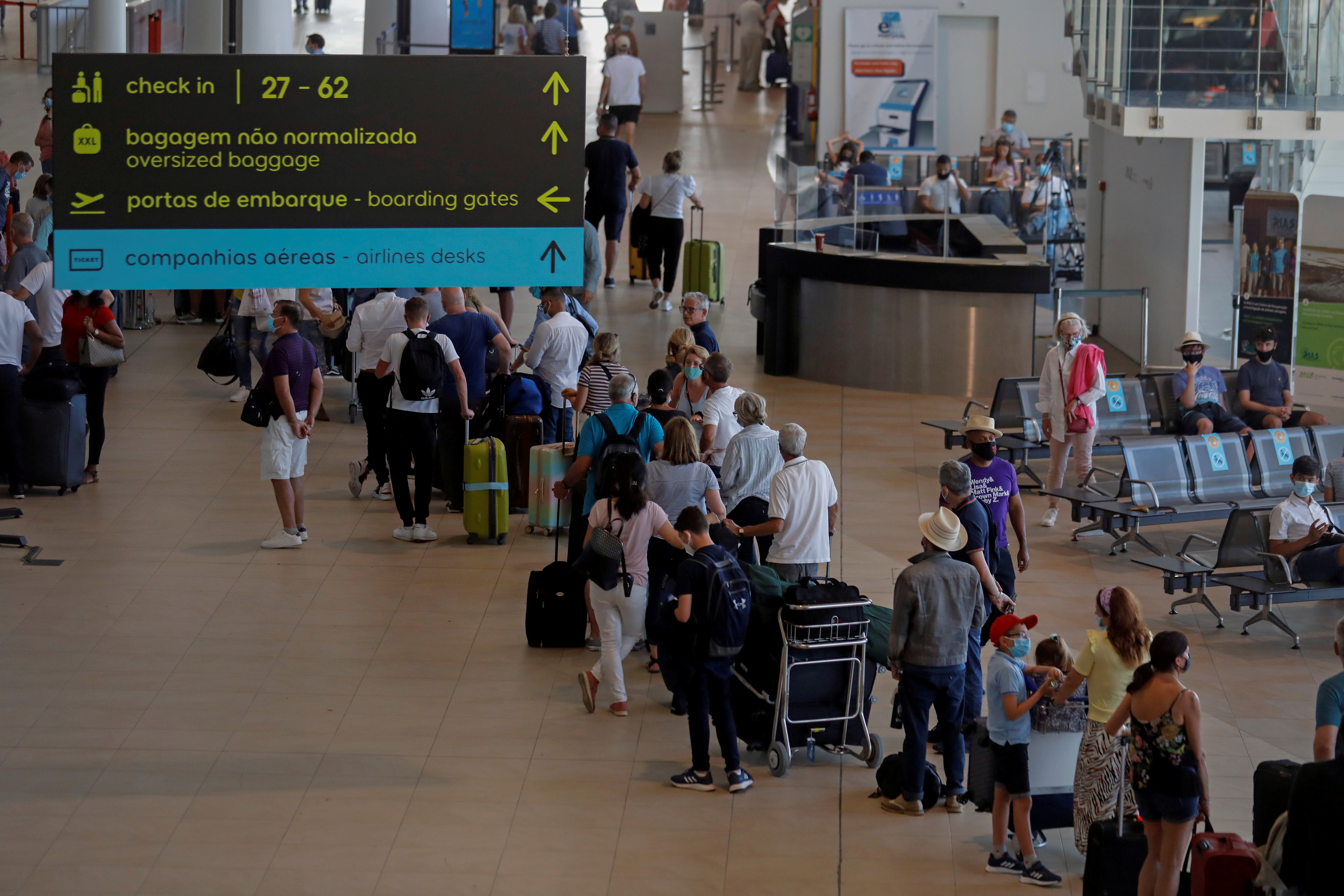 Long queues at Lisbon airport to extend into summer Union Reuters