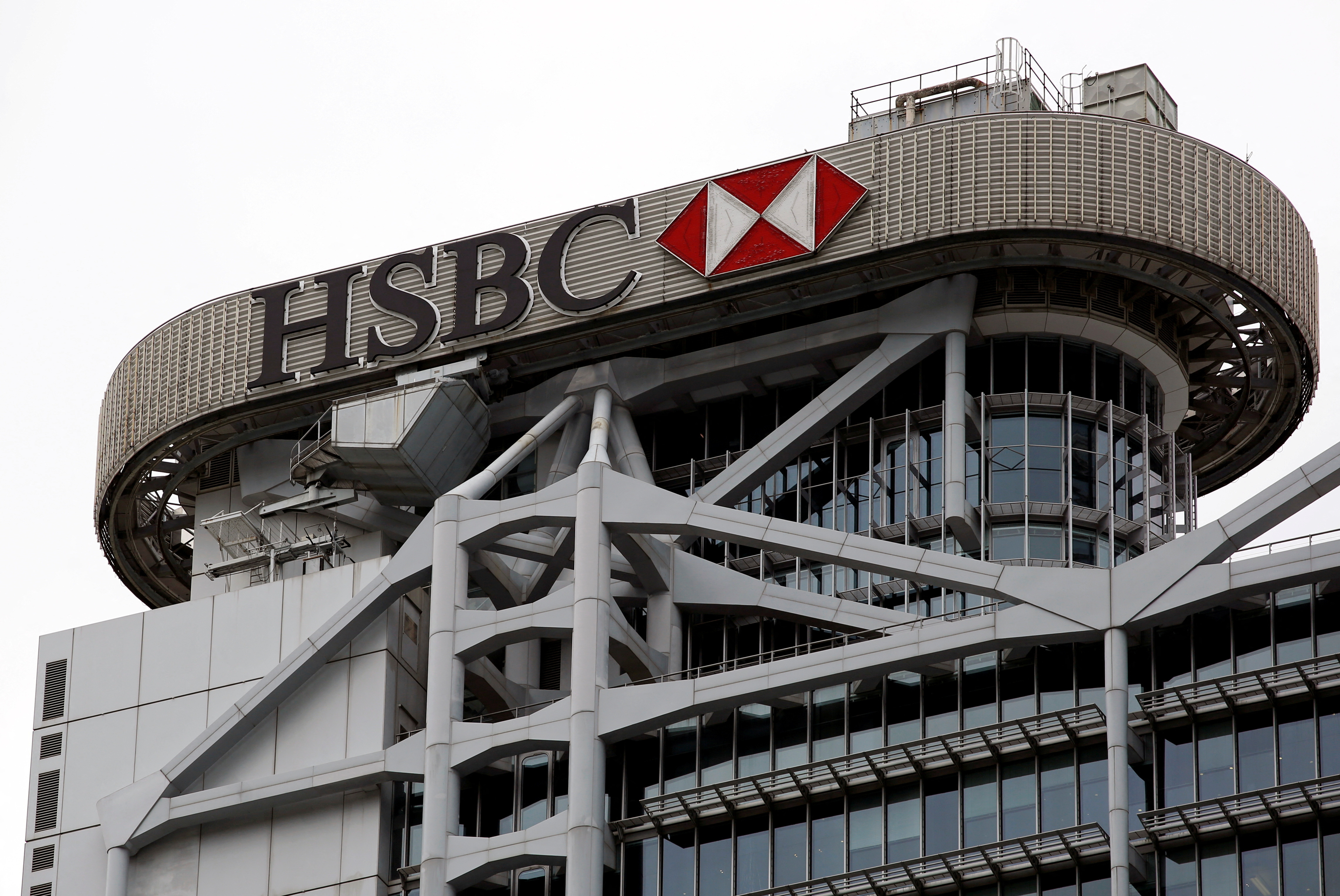 The logo of HSBC is seen on its headquarters in the financial Central district in Hong Kong