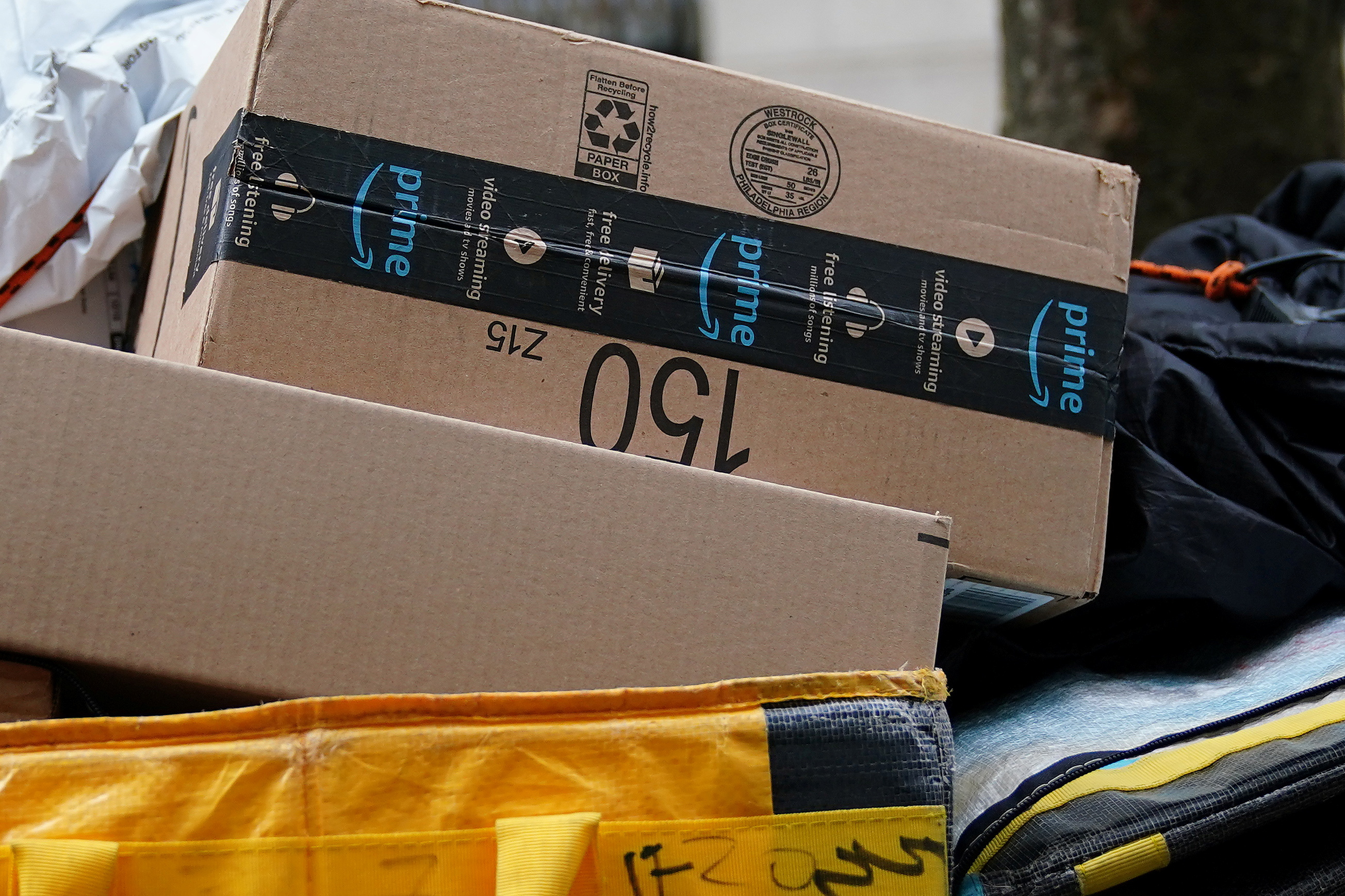 Amazon packages are pictured on a delivery cart in New York