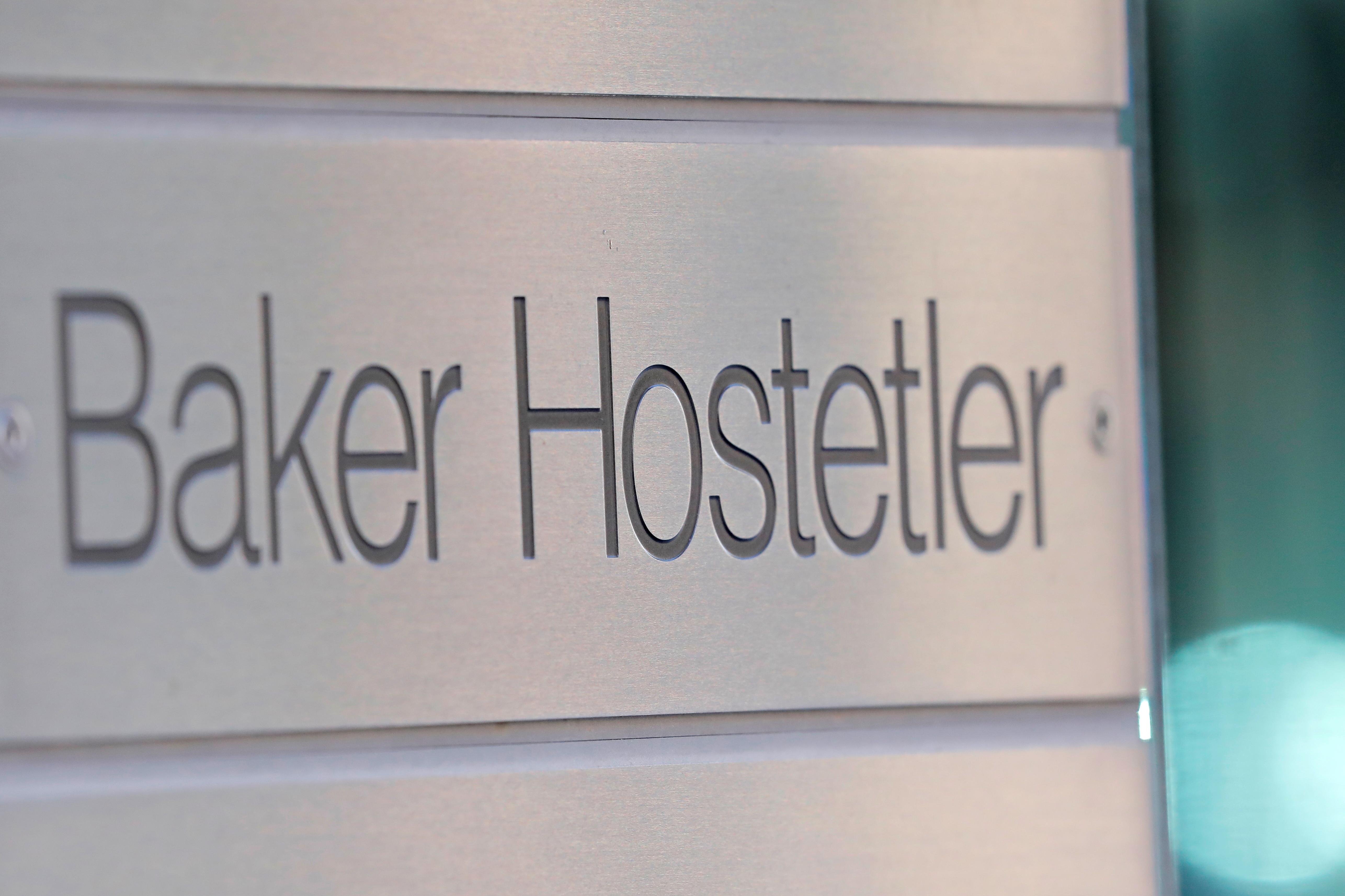 Signage is seen outside of the legal offices of the BakerHostetler law firm in Washington, D.C.