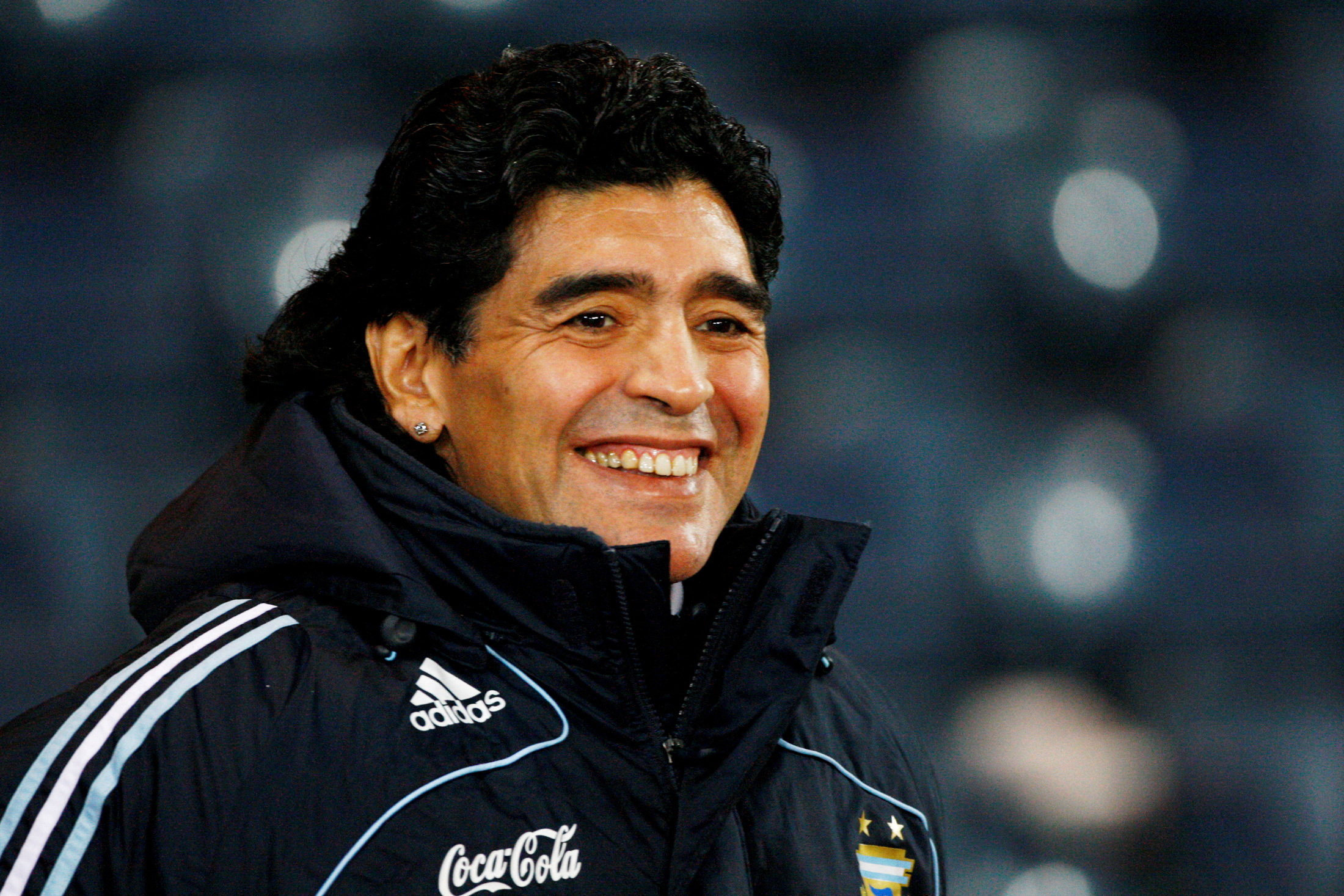 Argentina's soccer team head coach Maradona smiles during their international friendly soccer match against Scotland in Glasgow, Scotland