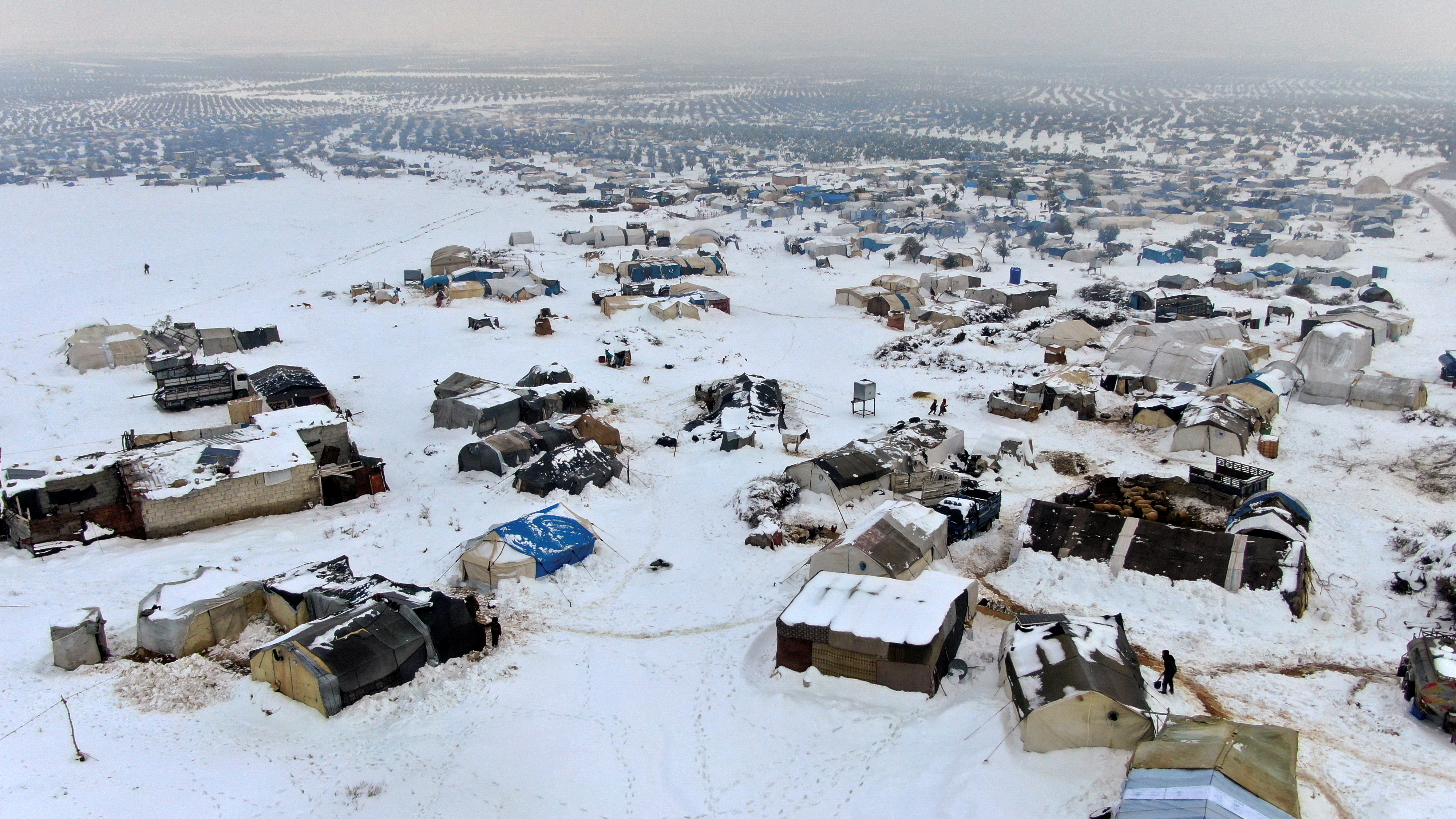 A snow covered camp for internally displaced people is seen in the Aleppo countryside