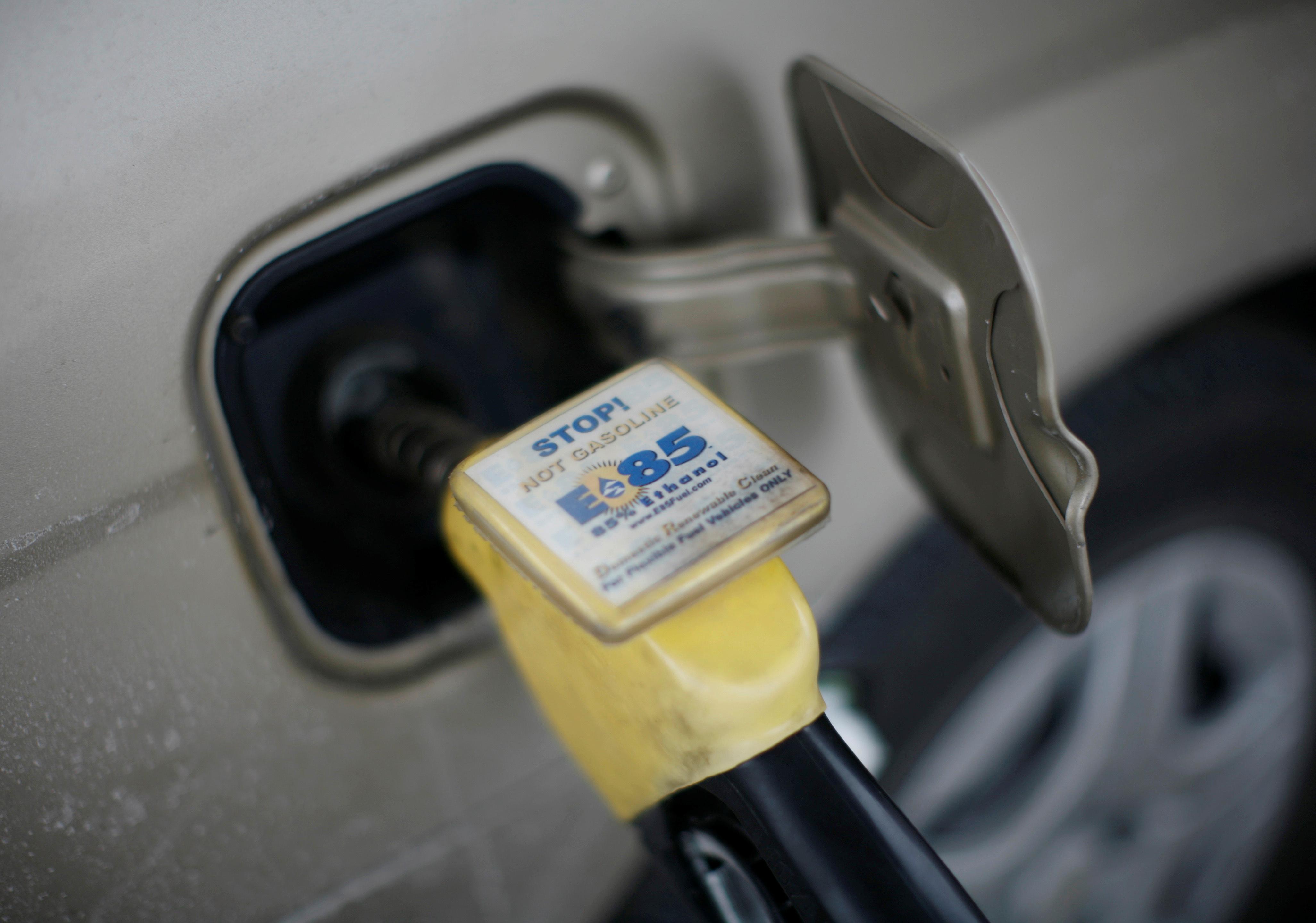 E85 Ethanol biodiesel fuel is shown being pumped into a vehicle at a gas station in Nevada, Iowa