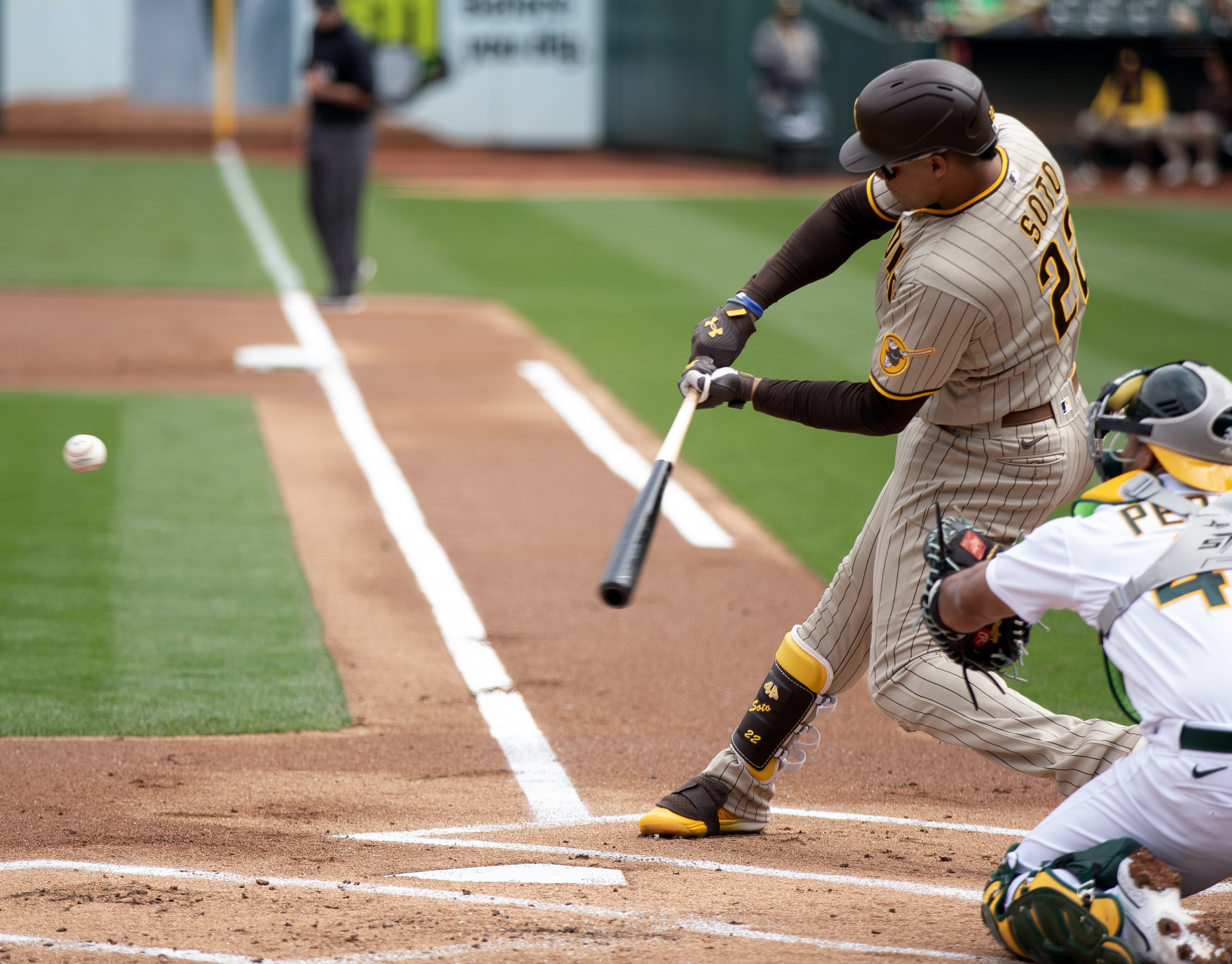 Padres edge A's, give rookie hurler first major league win