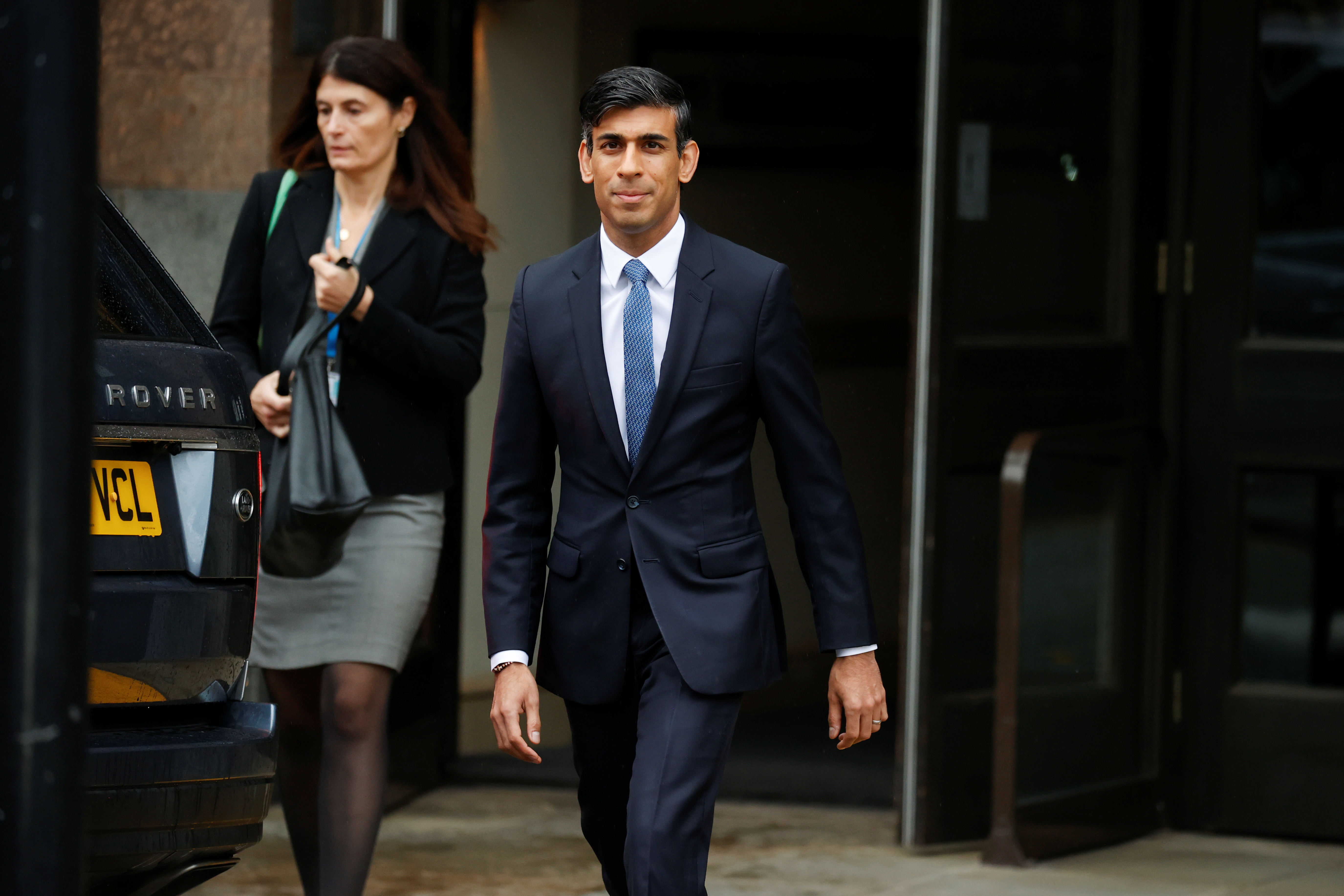 Britain's Chancellor of the Exchequer Rishi Sunak leaves a hotel to take part in the annual Conservative Party conference, in Manchester, Britain, October 5, 2021. REUTERS/Phil Noble