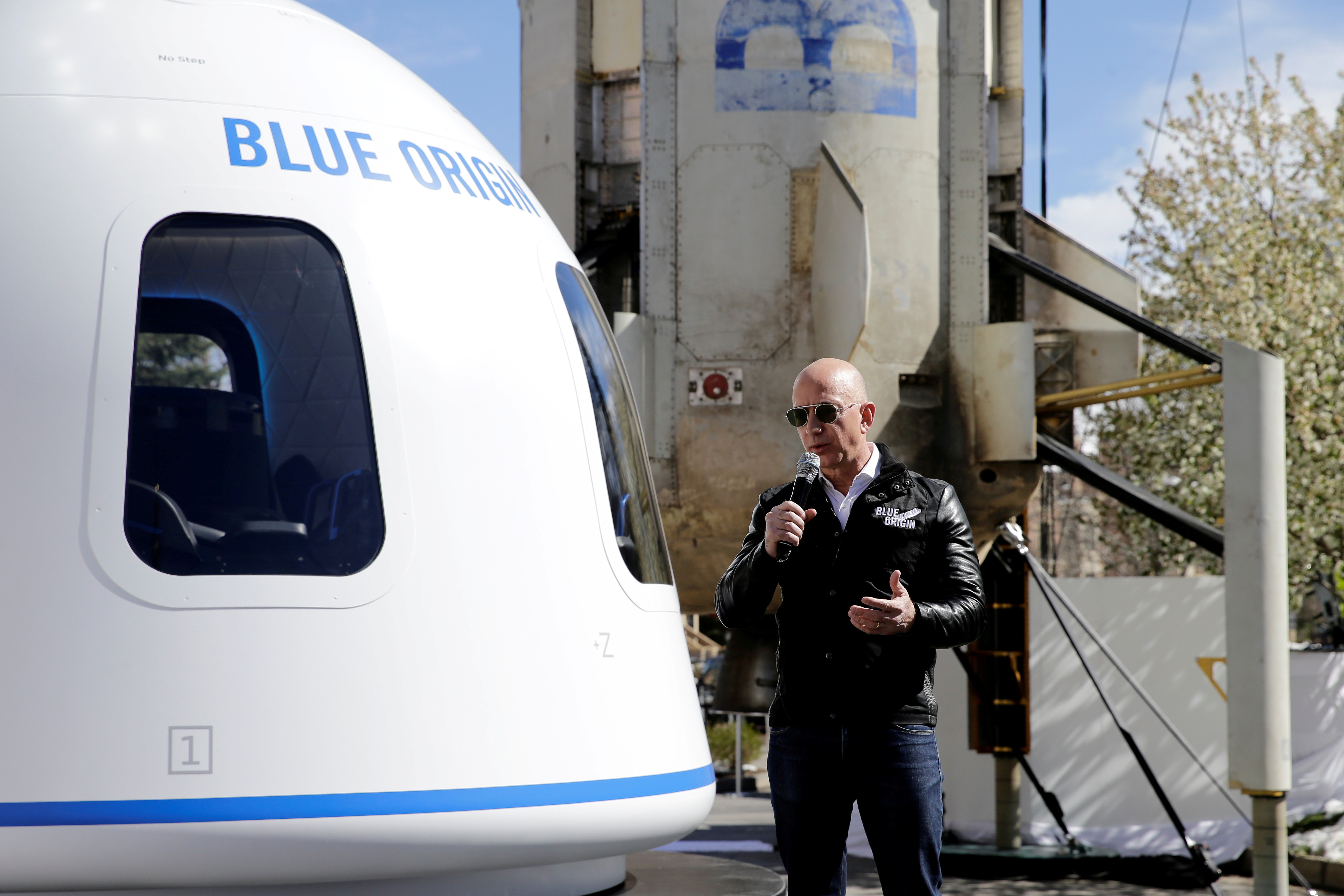 Amazon and Blue Origin founder Jeff Bezos addresses the media about the New Shepard rocket booster and Crew Capsule mockup at the 33rd Space Symposium in Colorado Springs, Colorado, United States April 5, 2017.  REUTERS/Isaiah J. Downing/File Photo