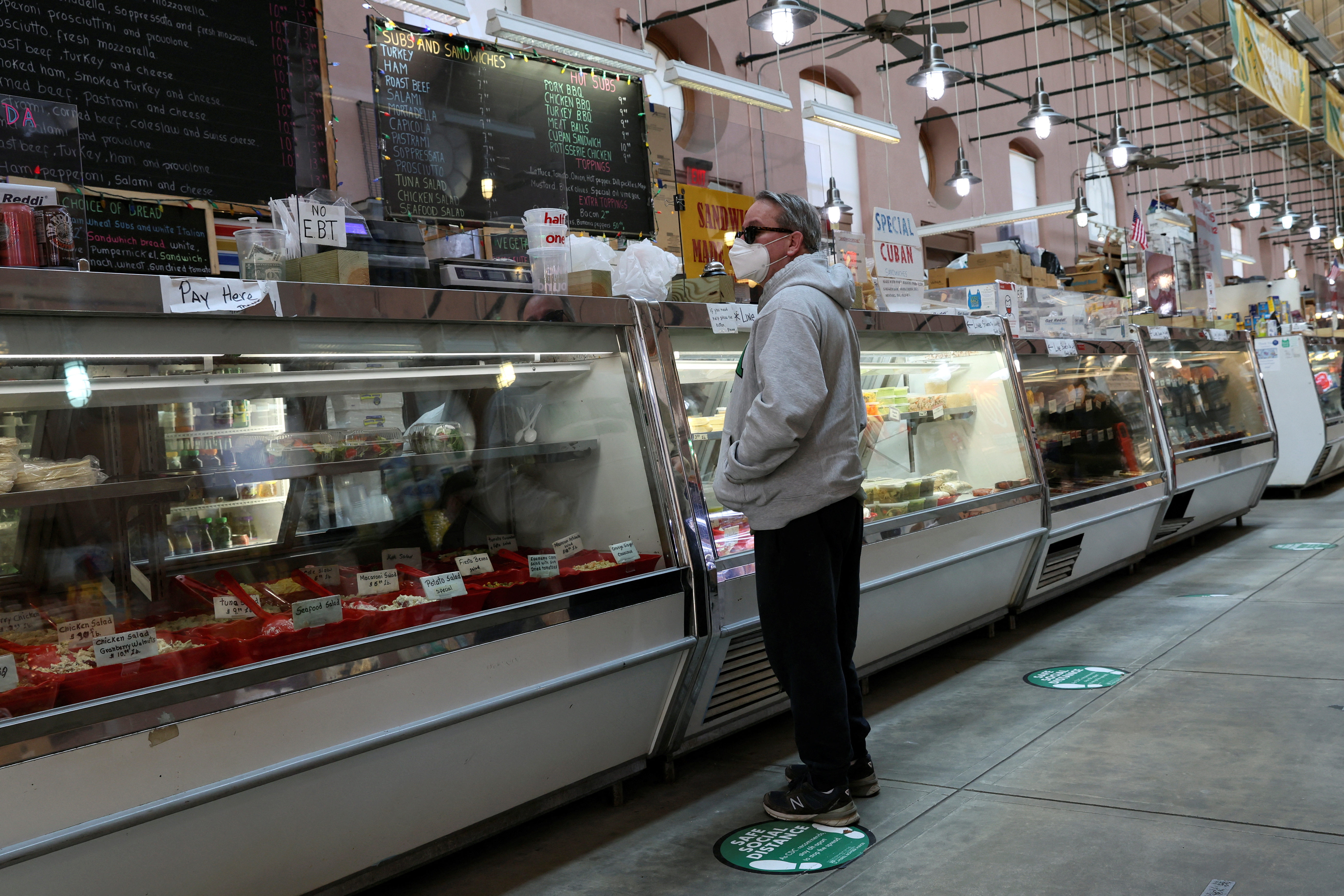 A man shops at the Eastern Market in Washington