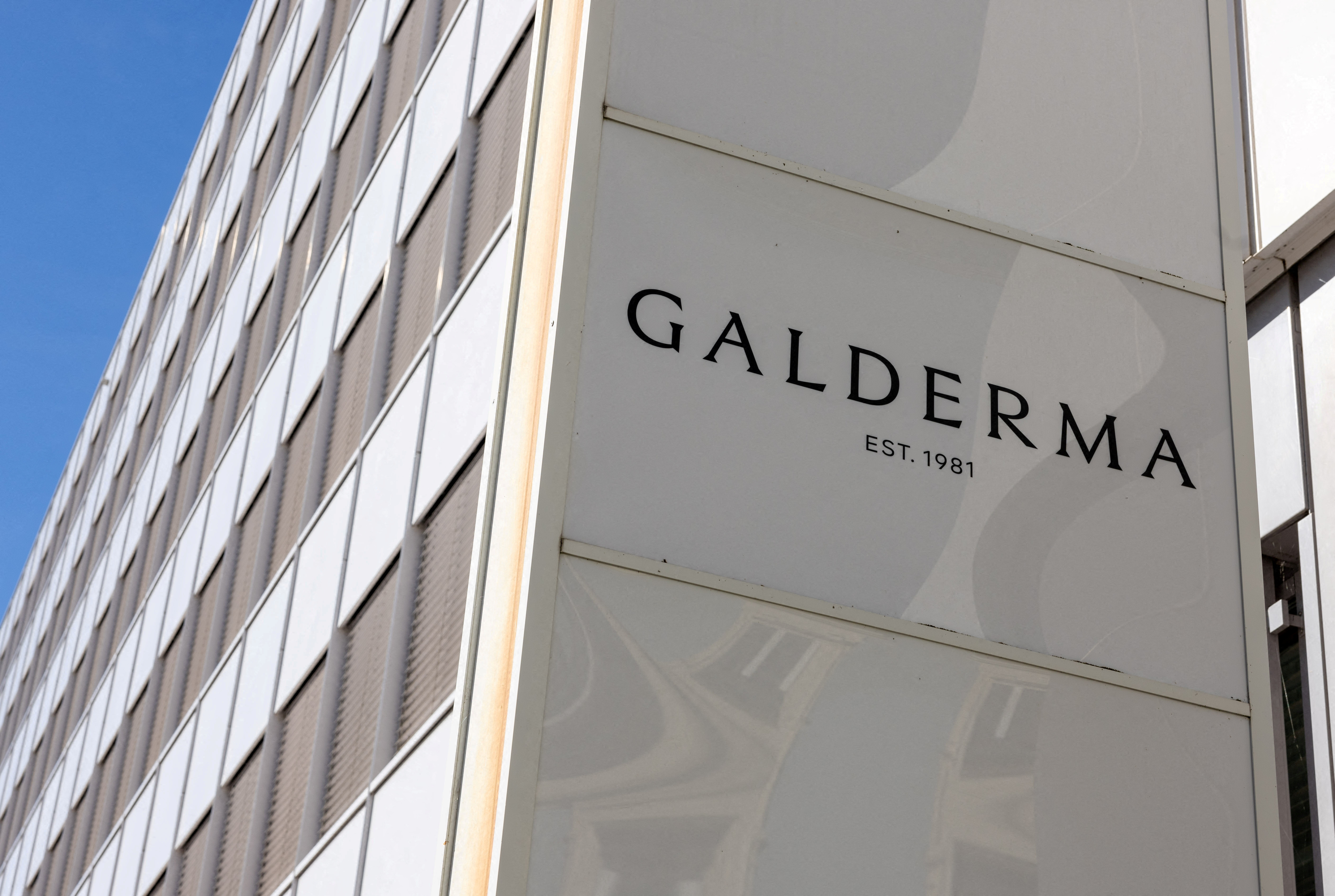 A logo of skin care company Galderma is pictured on the company's offices in Lausanne