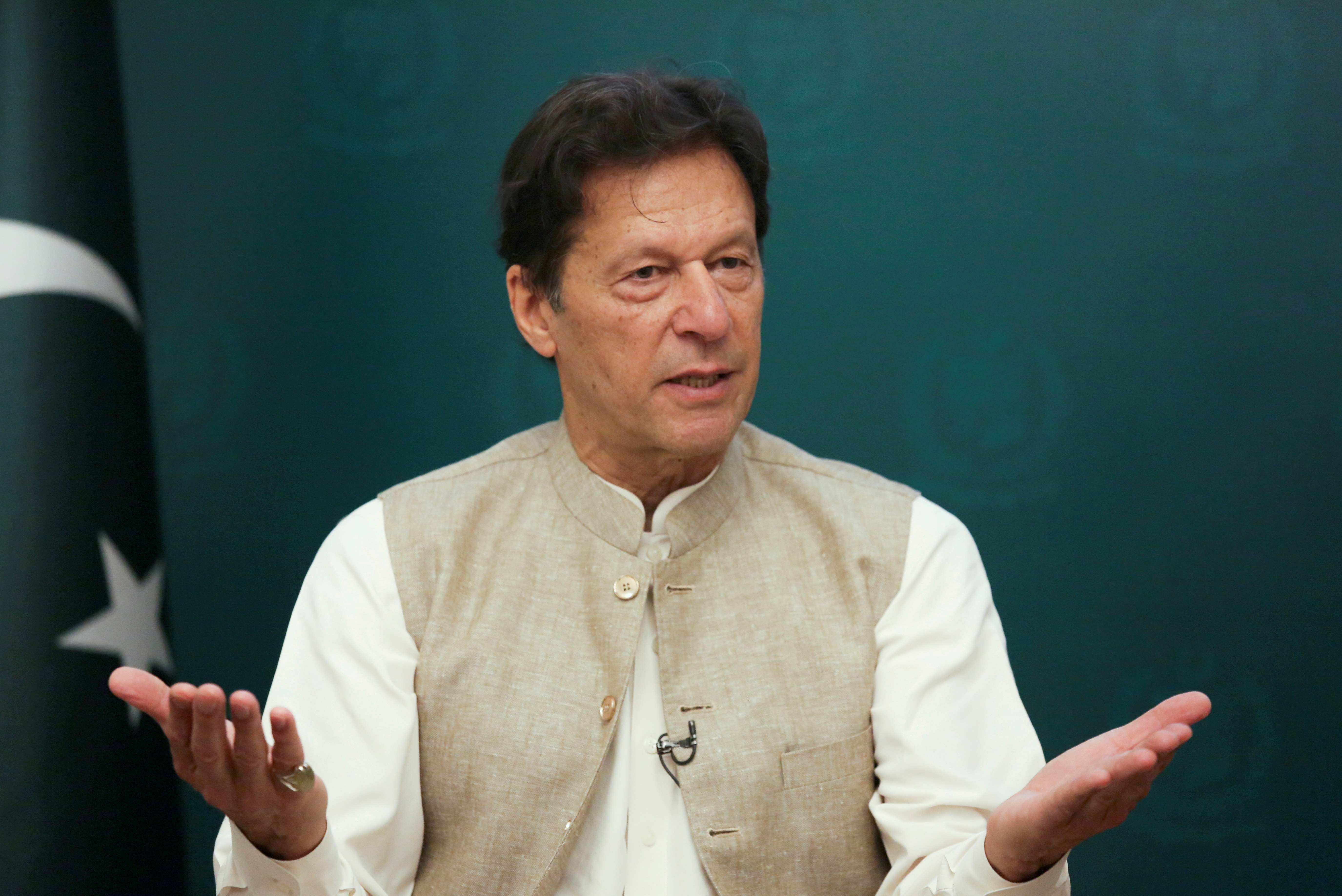 Pakistan's Prime Minister Imran Khan gestures during an interview with Reuters, in Islamabad