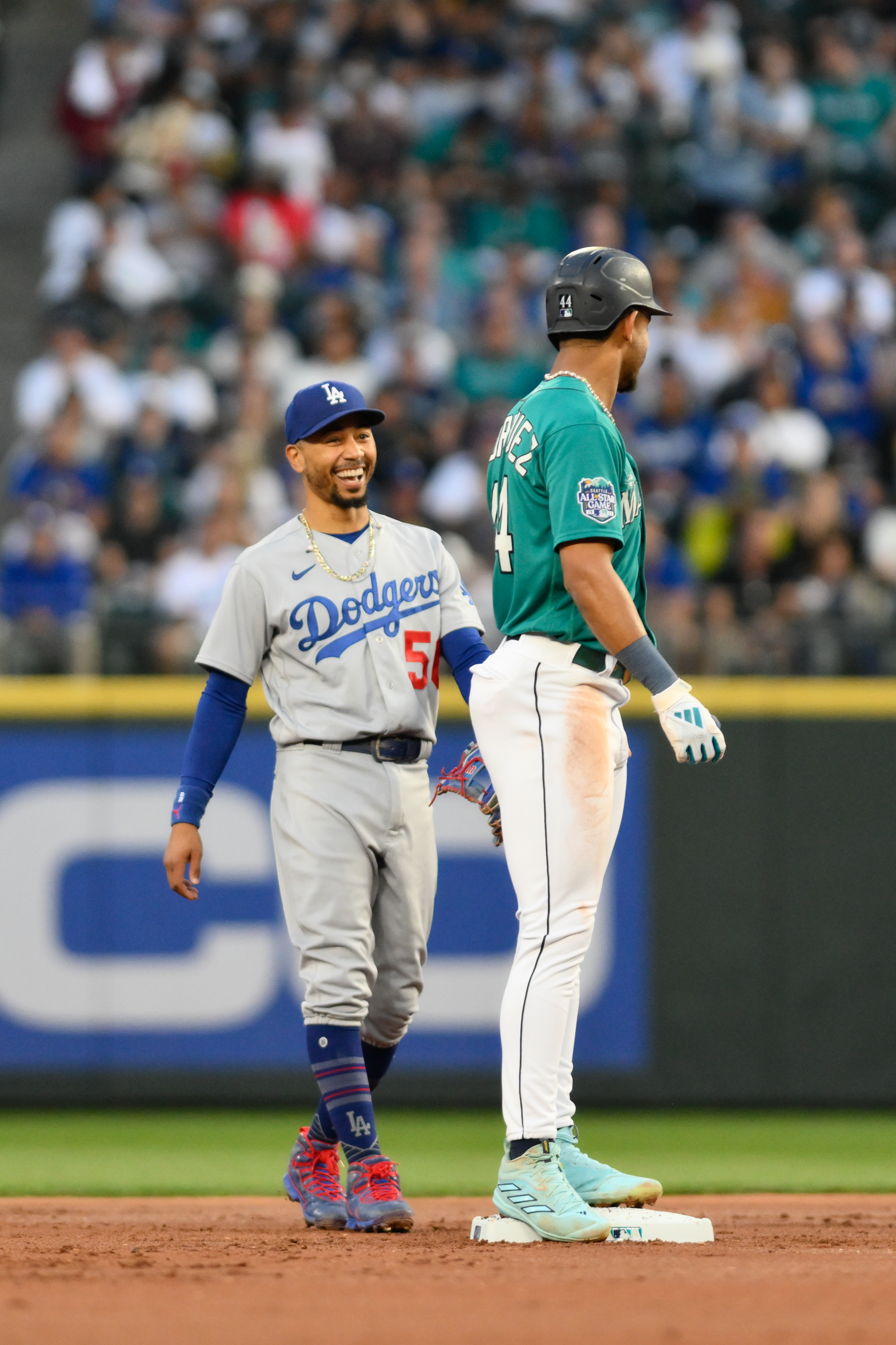 Dodgers clinch NL West title with 6-2 win over Mariners for 10th