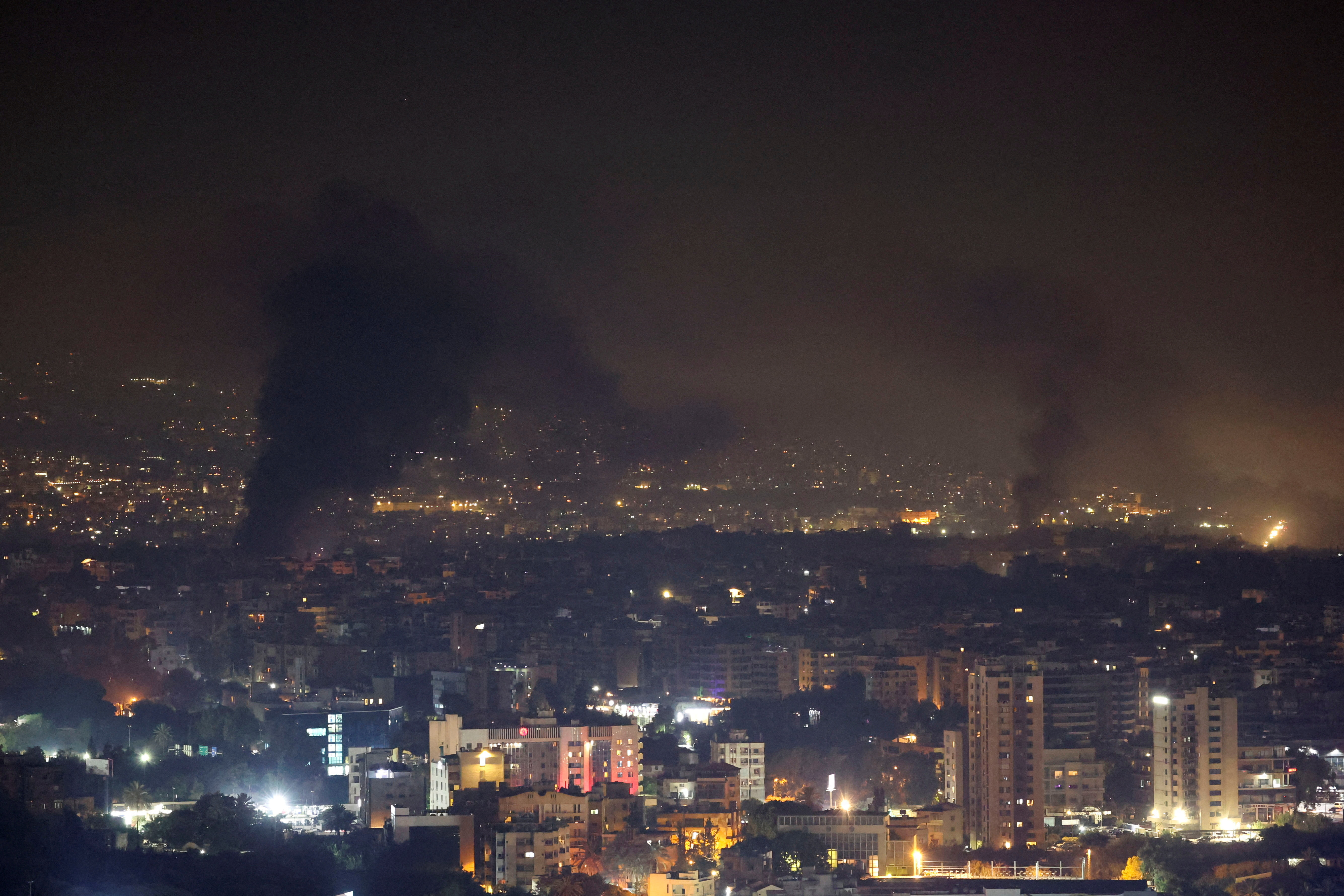 Smoke billows following an Israeli strike over Beirut's southern suburbs, amid ongoing hostilities between Hezbollah and Israeli forces, as seen from Sin El Fil, Lebanon, September 28, 2024. REUTERS/Mohamed Azakir