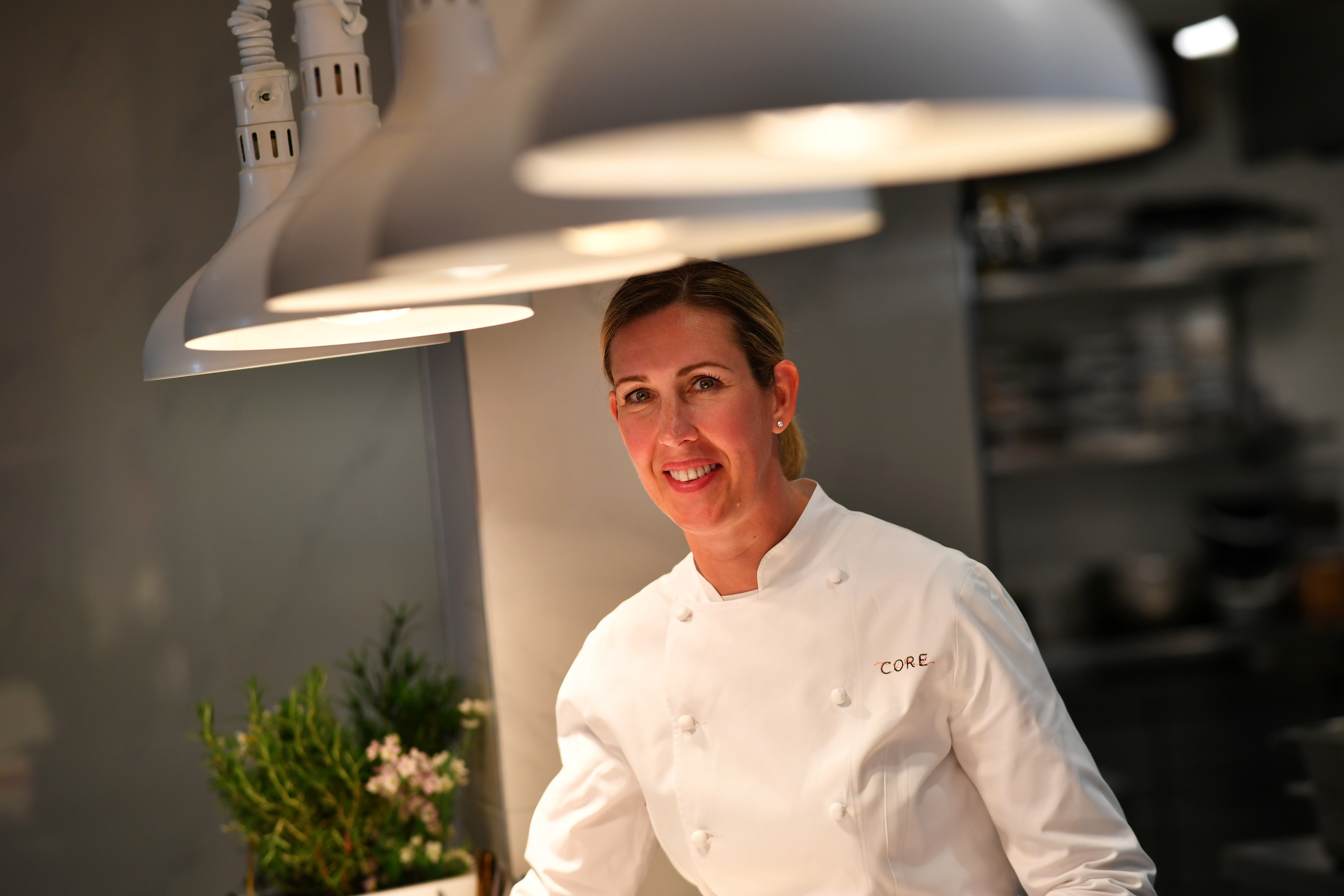 Britain's newest winner of three Michelin stars, Clare Smyth smiles at her Core restaurant in London