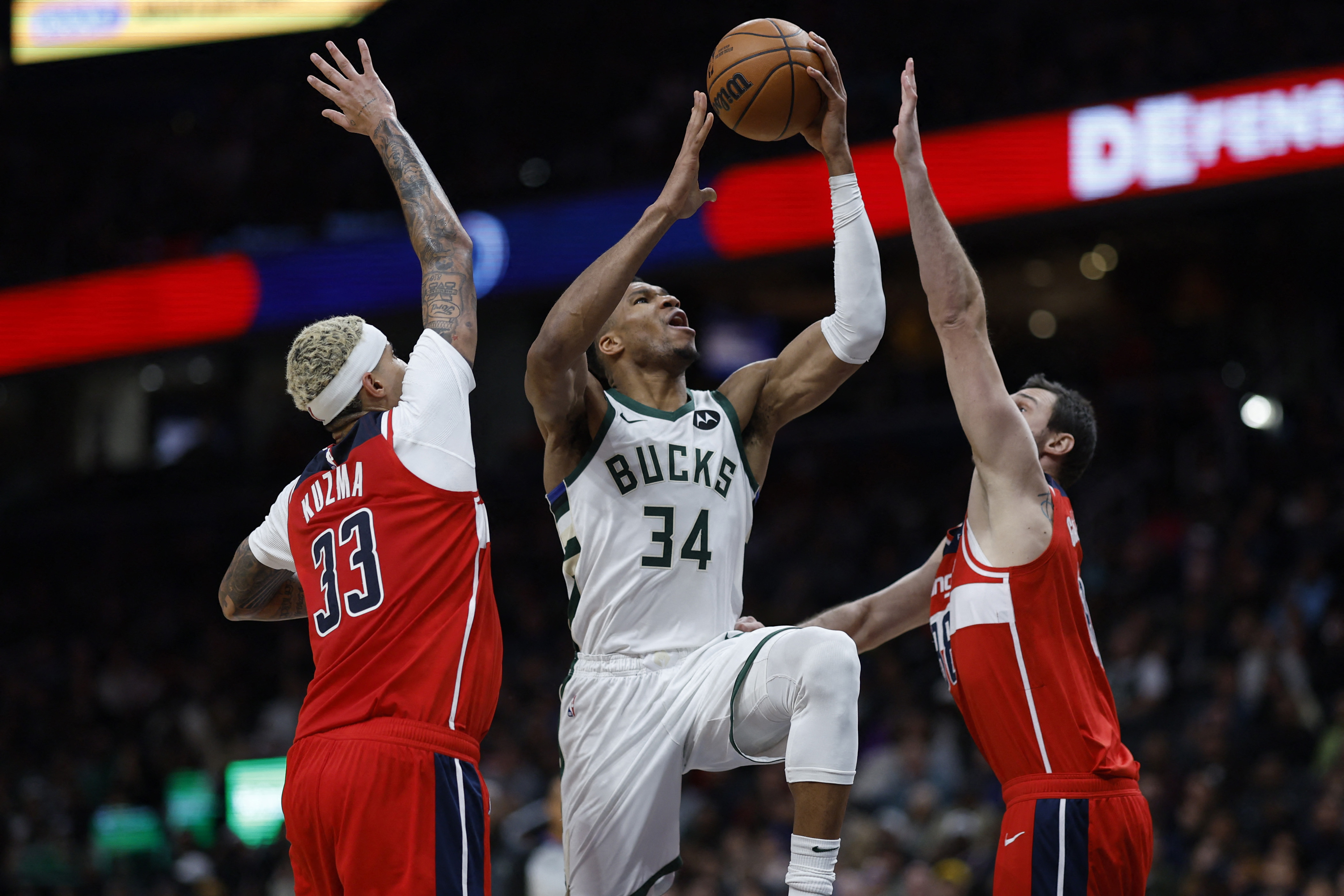 Offense Leads The Way As Bucks Beat Wizards | Reuters