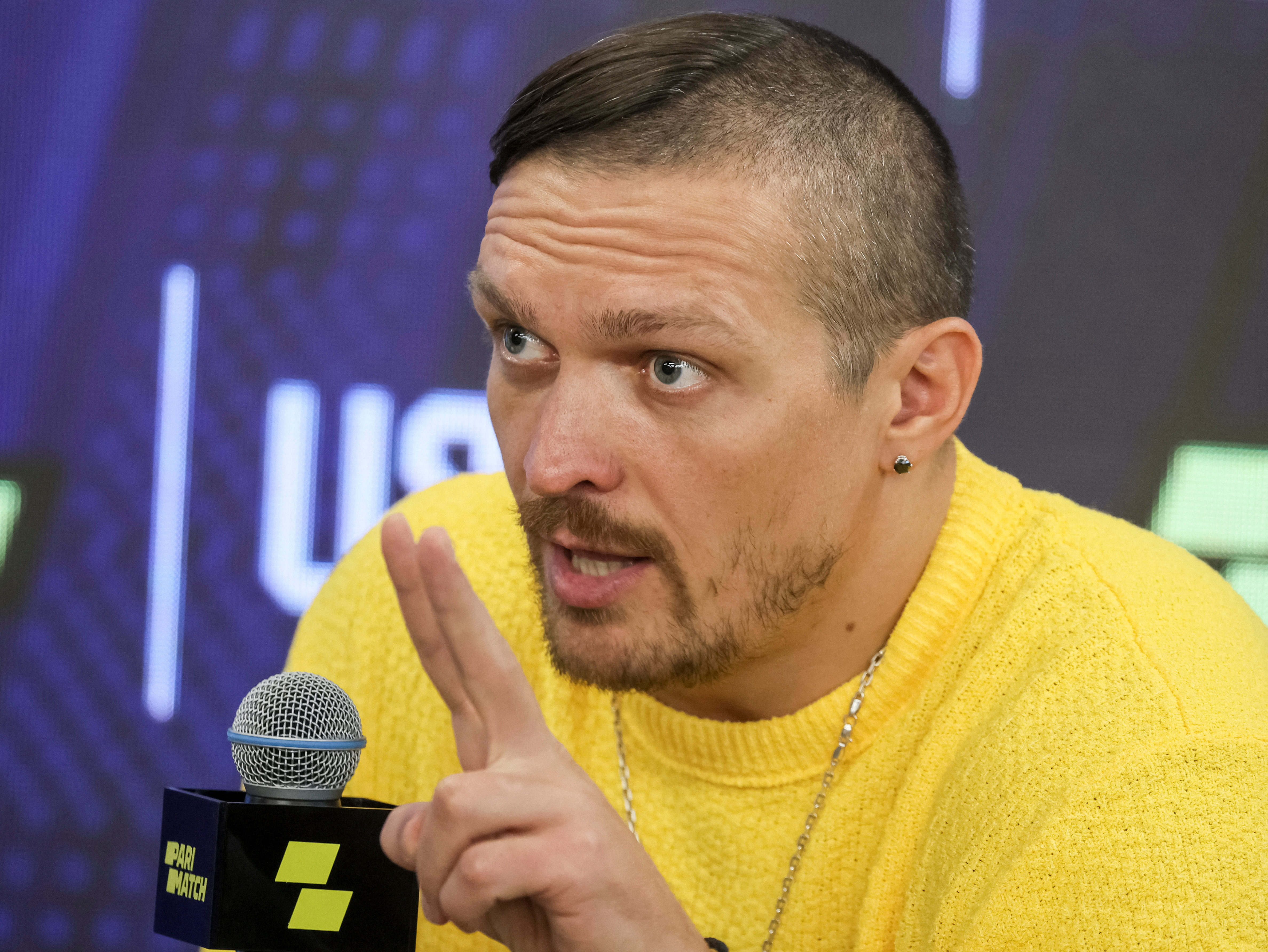 Ukraine's unified world heavyweight boxing champion Usyk attends a news conference in Kyiv