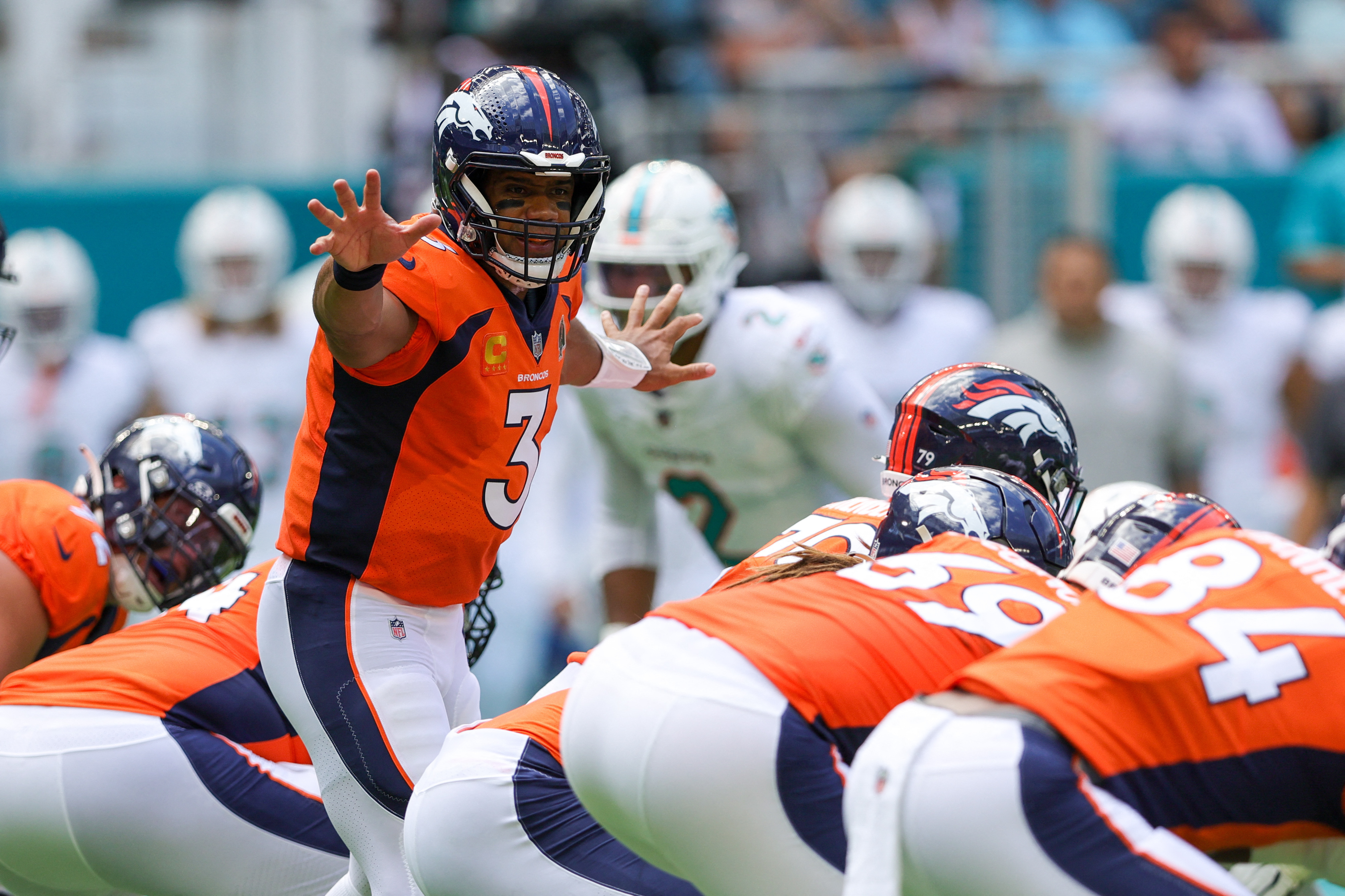 Dolphins pour it on with 70-20 rout over Broncos, Fieldlevel